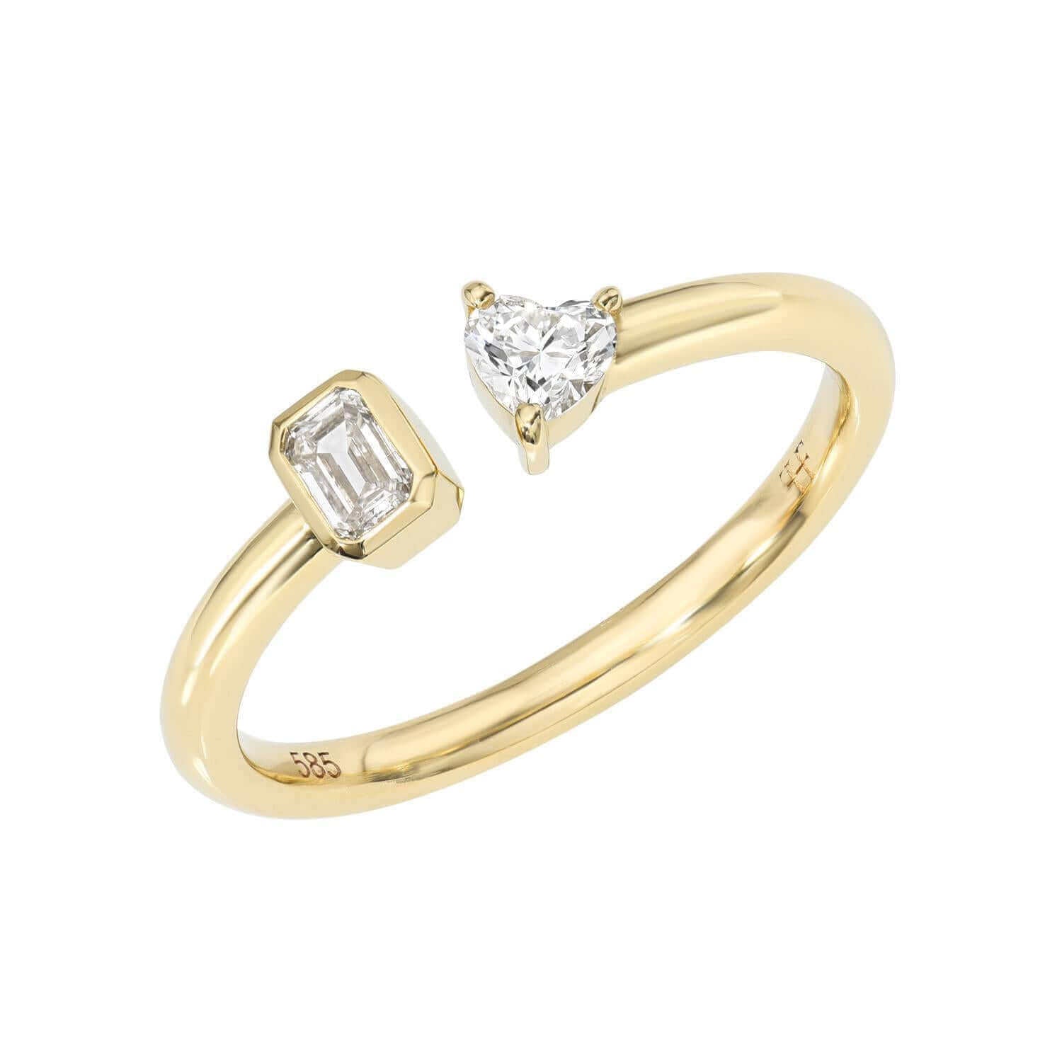 The Emerald & Heart Toi Et Moi Ring features a gold open band with an emerald-cut and a heart-shaped diamond at each end, symbolizing love in fine jewelry.