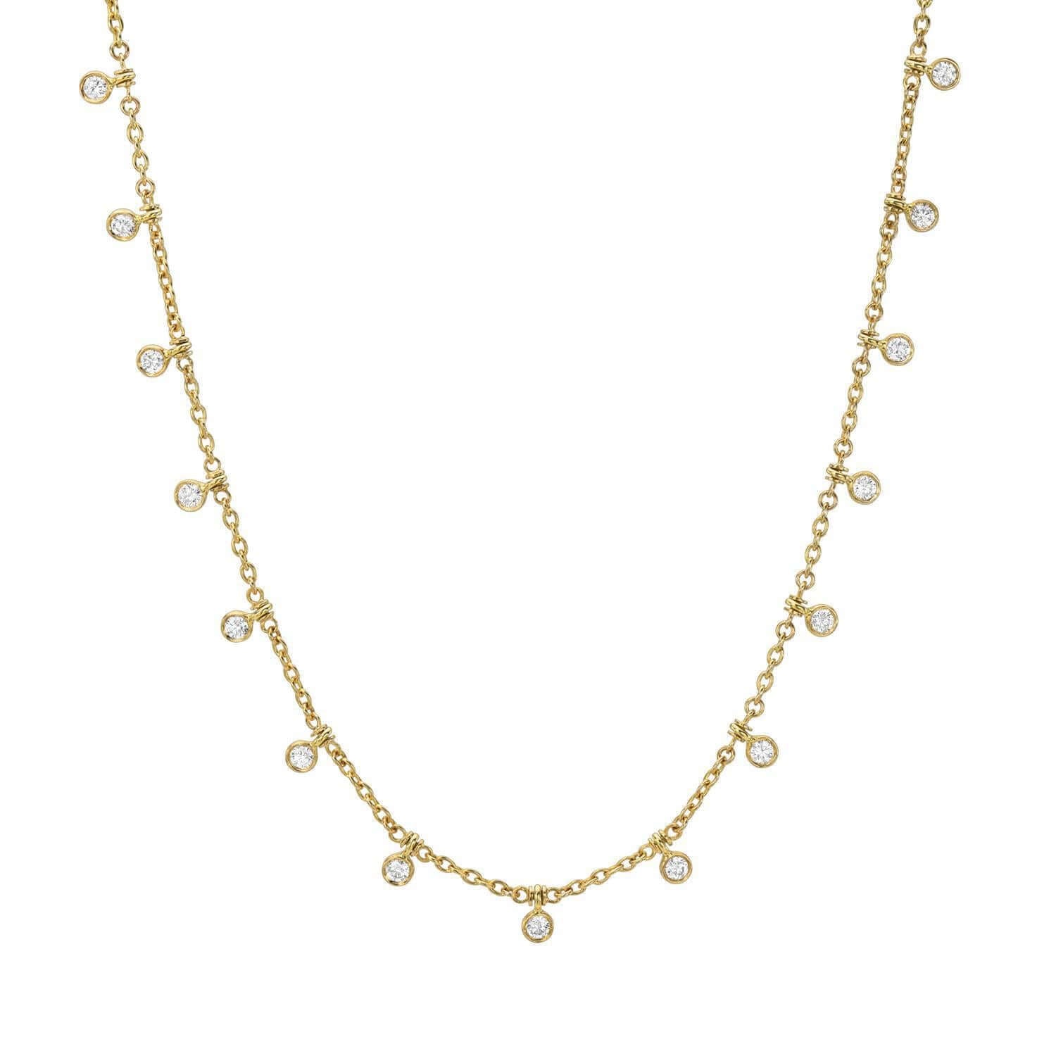 The Diamond Lyla Necklace from Janet Heller Fine Jewelry, is crafted in 14KT gold and features small round diamond pendants.  The necklace can be worn on its own or layered with other chains.