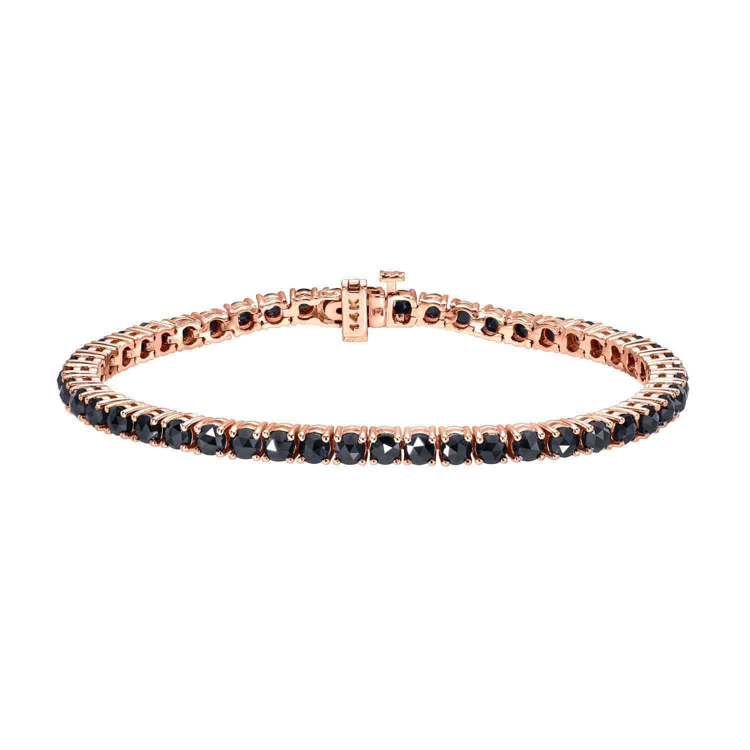 A rose gold Black Diamond Tennis Bracelet (SKU: BRA-174-Y) from Janet Heller Fine Jewelry, featuring a single row of round black diamonds in prong settings, displayed on a white background. This elegant piece showcases expert craftsmanship and the timeless allure of fine jewelry.
