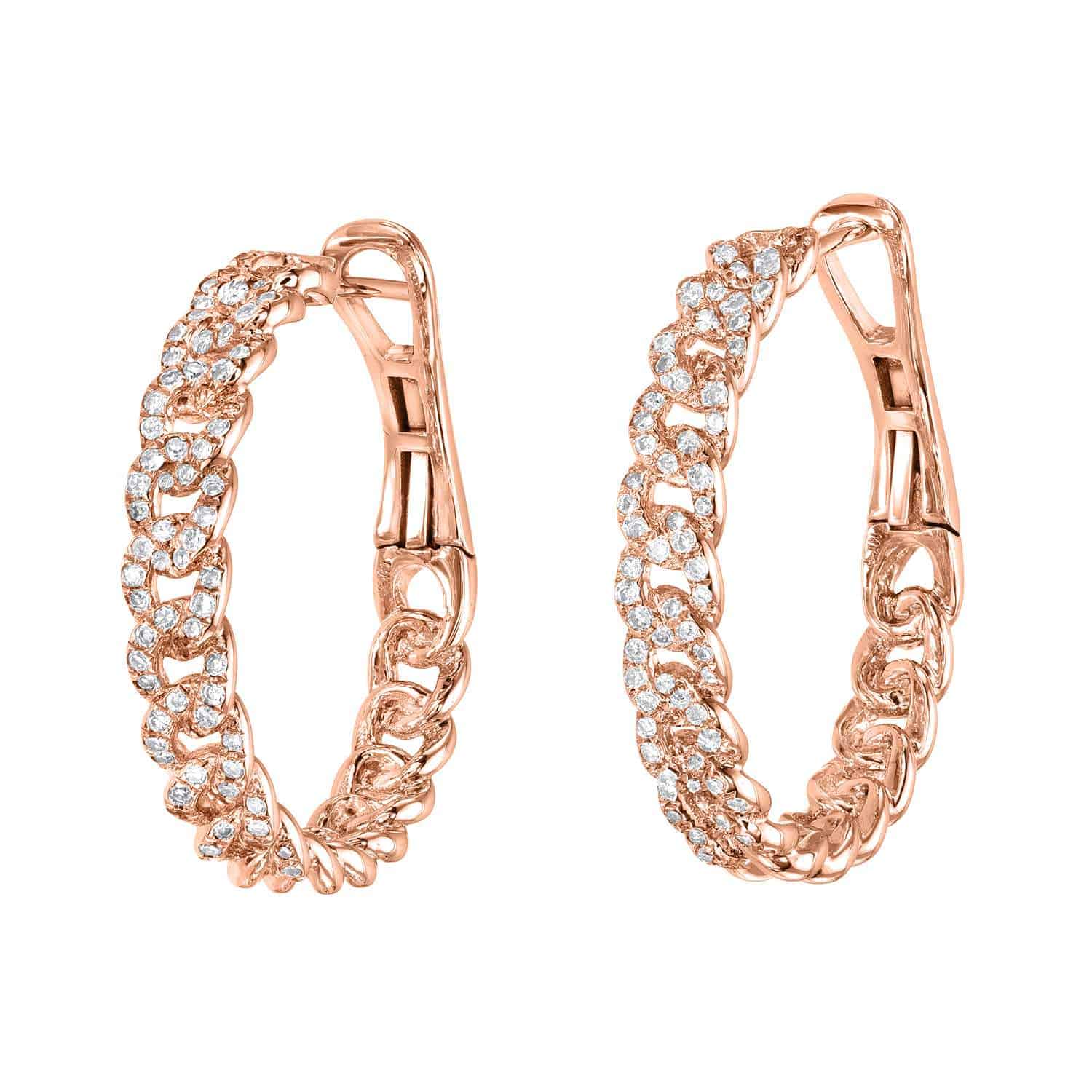 The Chain Link Easton Hoops from Janet Heller Fine Jewelry are crafted in 14KT gold. The earrings feature a chain-link design adorned with pave diamonds. The hoops can be worn on their own or along the ear with other earrings.