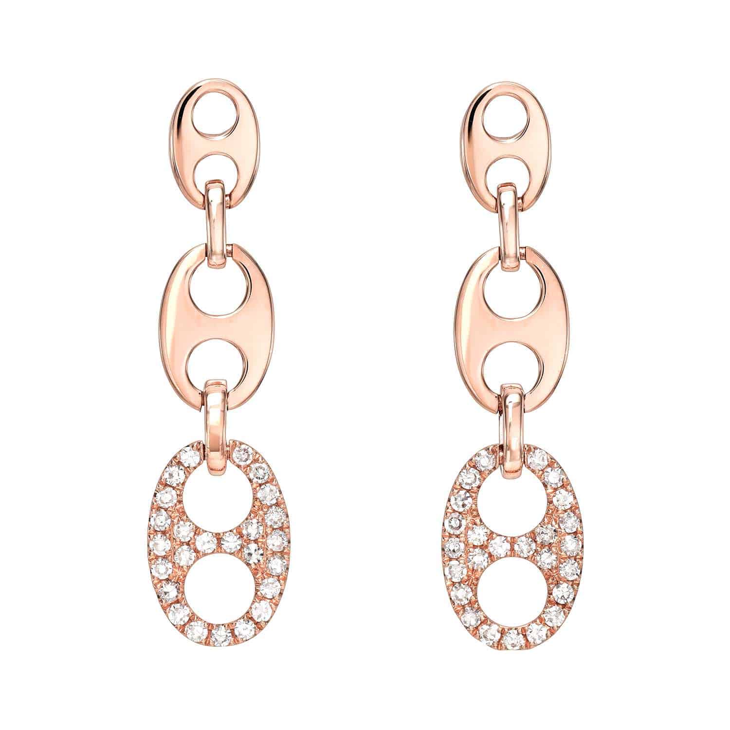 The Diamond Aria Earrings feature linked gold oval shapes with small circular cutouts. Each earrings bottom oval is adorned with sparkling white gemstones, offering a dazzling piece of fine jewelry that can be customized for specific inquiries.