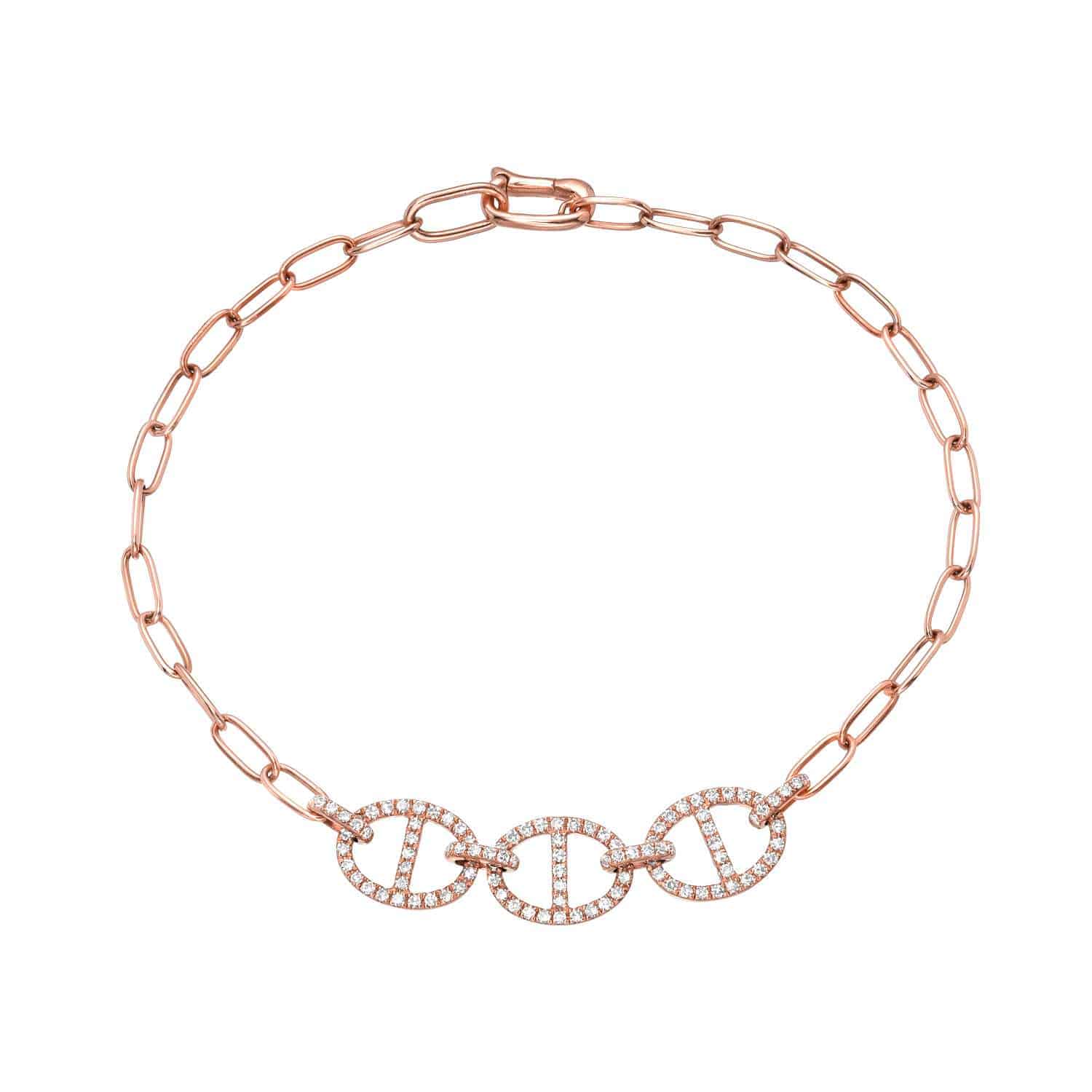 The Diamond Presley Bracelet by Foundry Fine Jewelry showcases a rose gold chain-link design with three circular pendants, each encrusted with small diamonds, forming the exquisite centerpiece of this elegant piece.