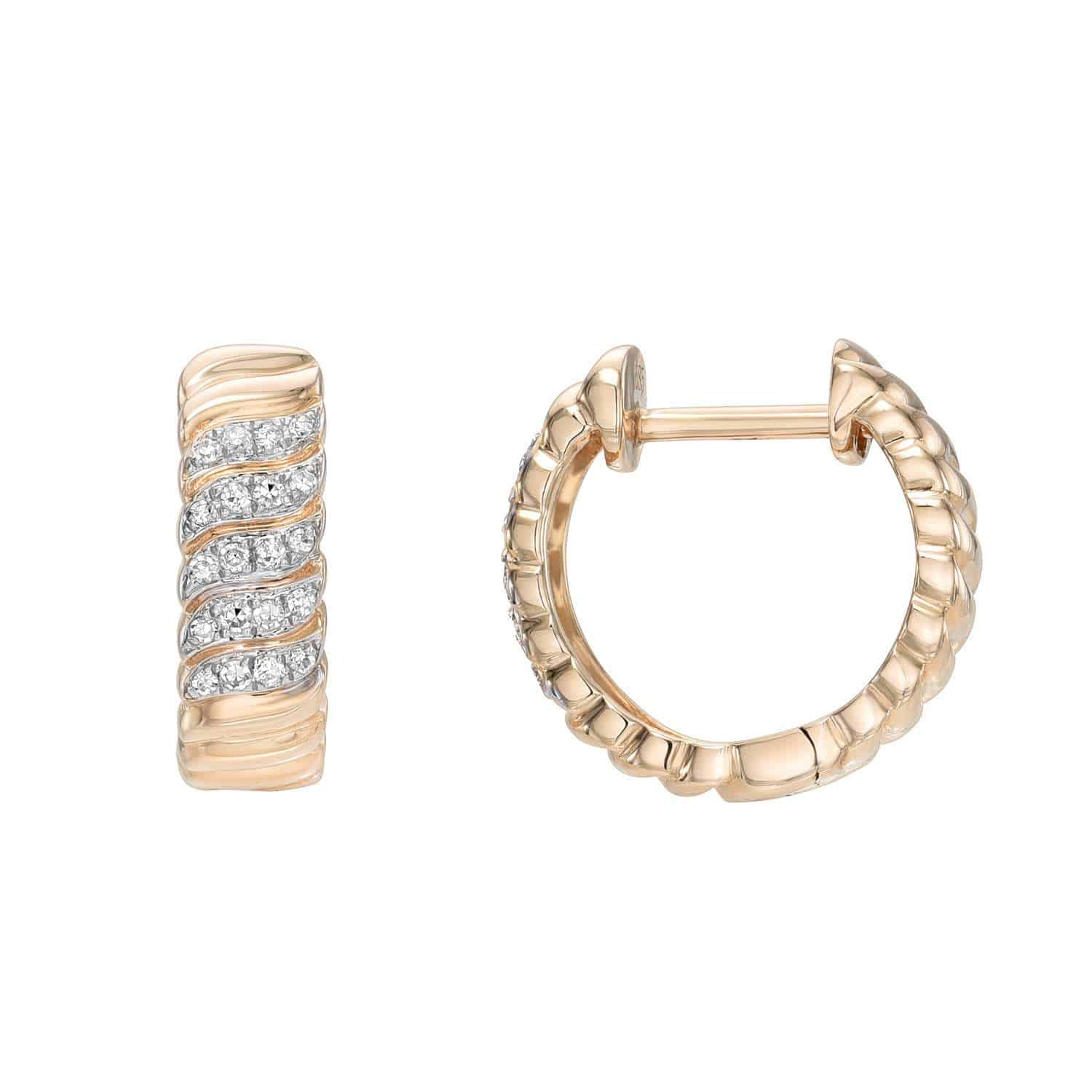 Janet Heller Fine Jewelry showcases the Diamond Swirl Huggies. One of these gold hoop earrings features a wavy design with embedded diamonds, and the other displays its latch closure. For customizations or inquiries, please contact us directly.