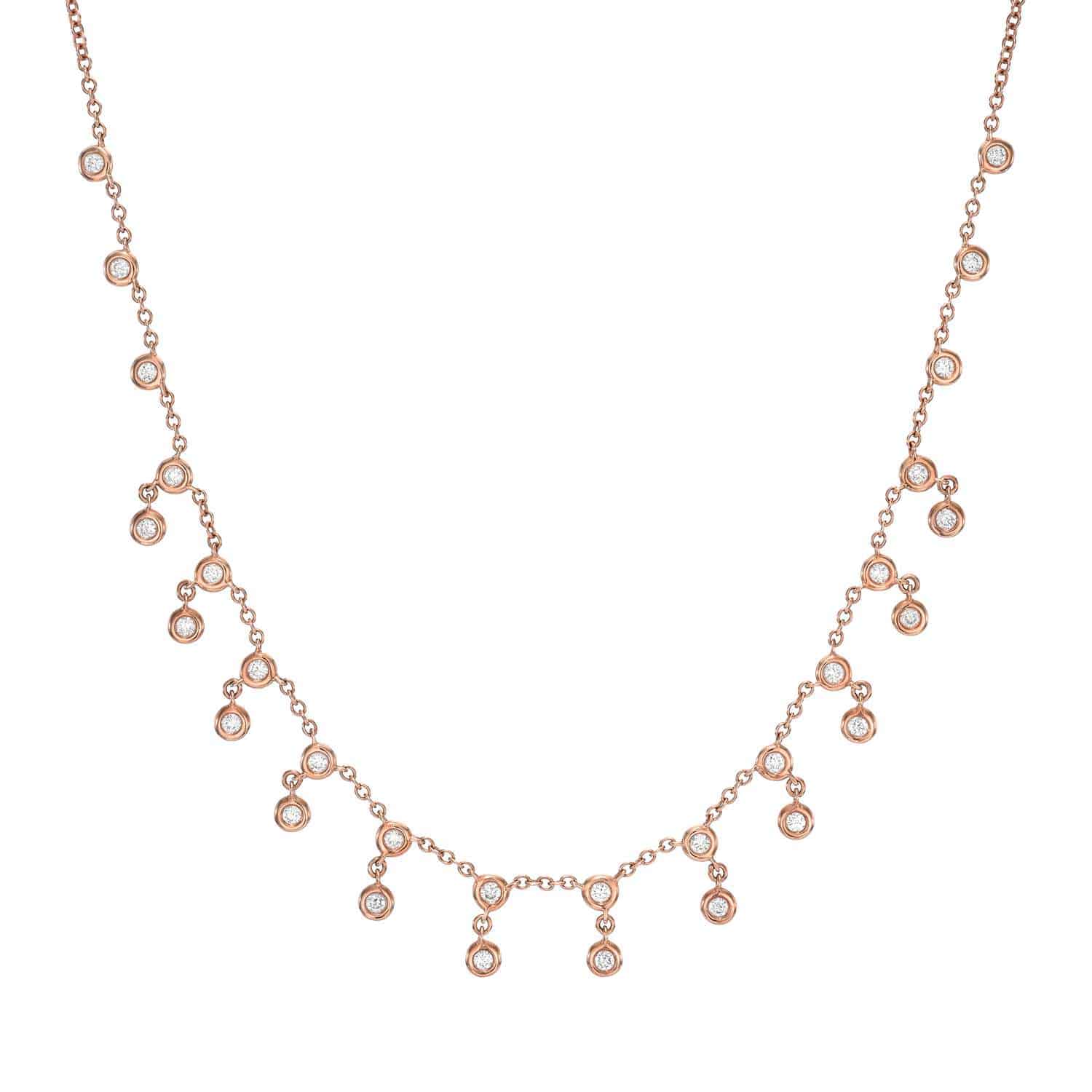 The Double Diamond Bezel Necklace (NEC-339-Y) from Janet Heller Fine Jewelry features bezel-set round diamonds spaced along a delicate rose gold chain, offering a timeless look for $2075.