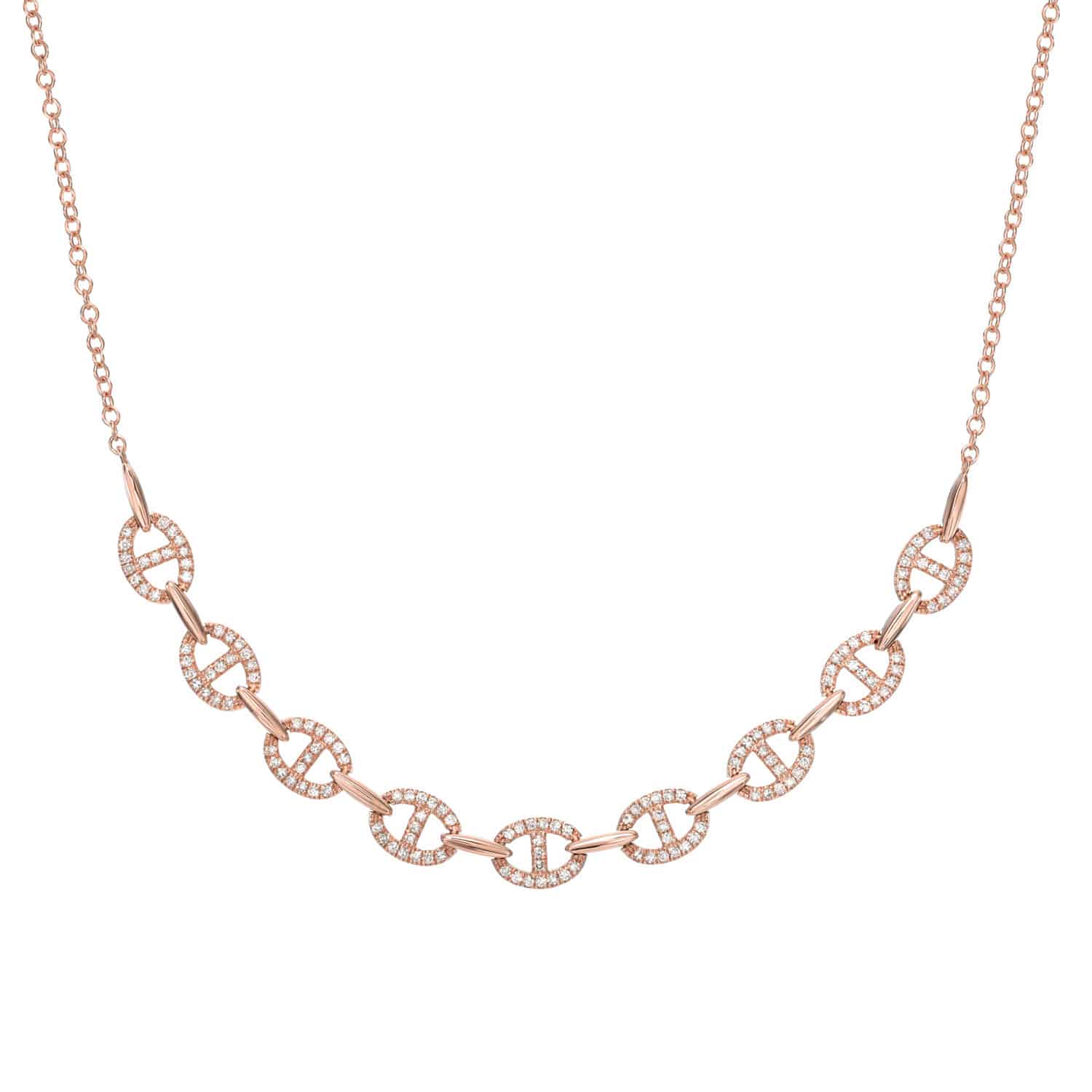 The Full Diamond Kaia Necklace is a delicate rose gold piece with interlocking circular links, adorned with sparkling diamonds. Its simple and elegant design features diamond-studded circles connected by smooth, plain links.
