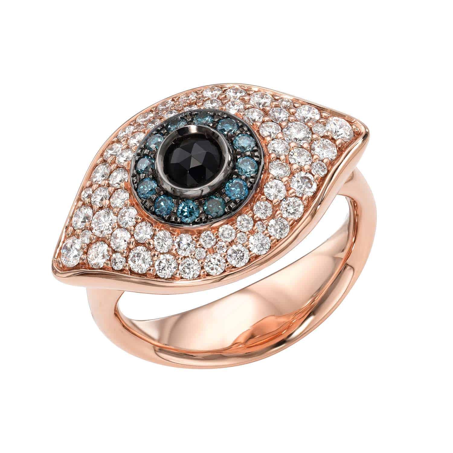 The Large Diamond Evil Eye Ring is an exquisite rose gold piece featuring an eye design with a central black stone, surrounded by blue gems and small white diamonds on a polished band. Available now for preorder.