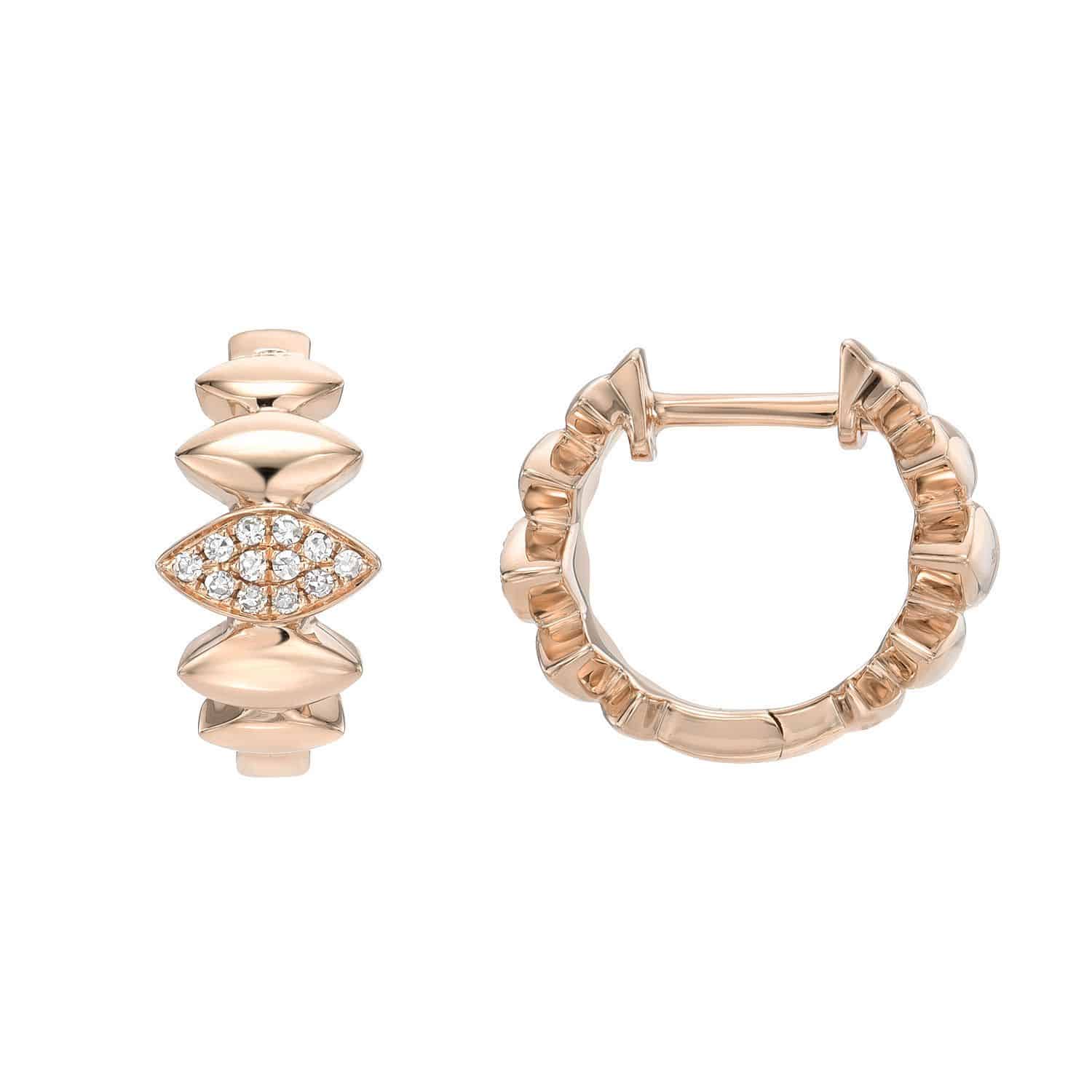 A close-up showcases two Marquise Cascade Huggies by Janet Heller Fine Jewelry: one upright with diamond marquise details, and the other flat, highlighting its textured surface. Both boast a glossy finish and exquisite customizations.