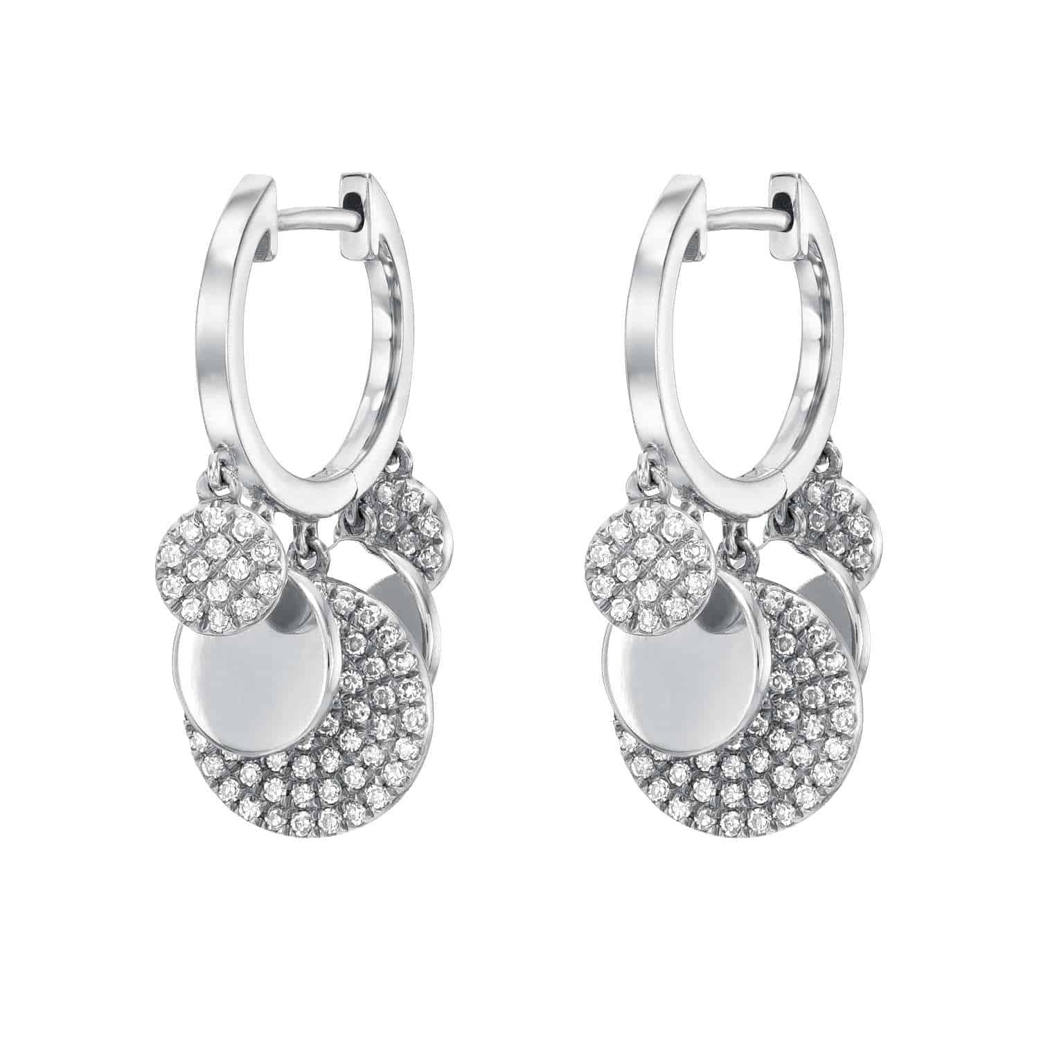 The Alternating Diamond Disc Huggies feature silver hoops adorned with dangling circular charms—some sleek and polished, others encrusted with small clear crystals—creating a layered, sparkling look that exemplifies the elegance of Janet Heller’s custom jewelry collection.