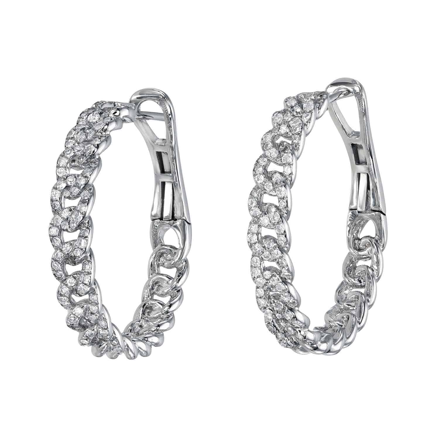 The Chain Link Easton Hoops from Janet Heller Fine Jewelry are crafted in 14KT gold. The earrings feature a chain-link design adorned with pave diamonds. The hoops can be worn on their own or along the ear with other earrings.