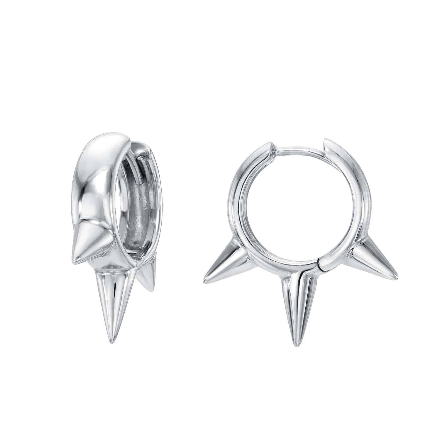 The Chunky Spike Hoops from Janet Heller Fine Jewelry are silver earrings featuring three evenly spaced, pointed spikes hanging from each one, creating a bold and edgy look. The image showcases both the front and side views of these exquisite pieces.