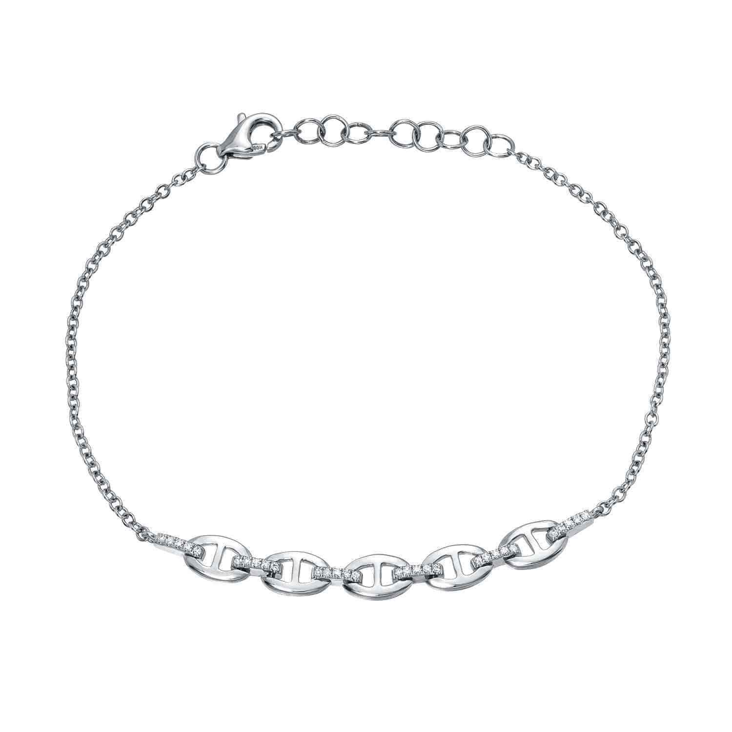 Discover the elegance of the Diamond Eloise Bracelet by Janet Heller Fine Jewelry, a delicate silver piece with a fine chain and five interlocking oval links at its center, secured by a lobster clasp closure—an elegant, timeless addition to any collection.