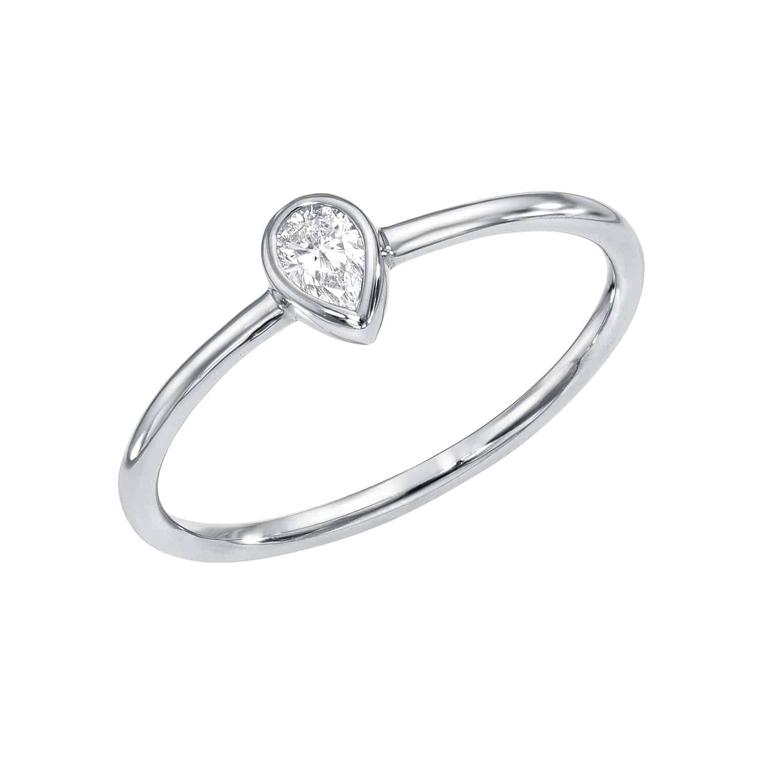Explore our jewelry collection with the Pear Cut Diamond Ring, featuring a teardrop-shaped diamond set vertically. Its minimalist silver design stands out against a white background. Preorder now.