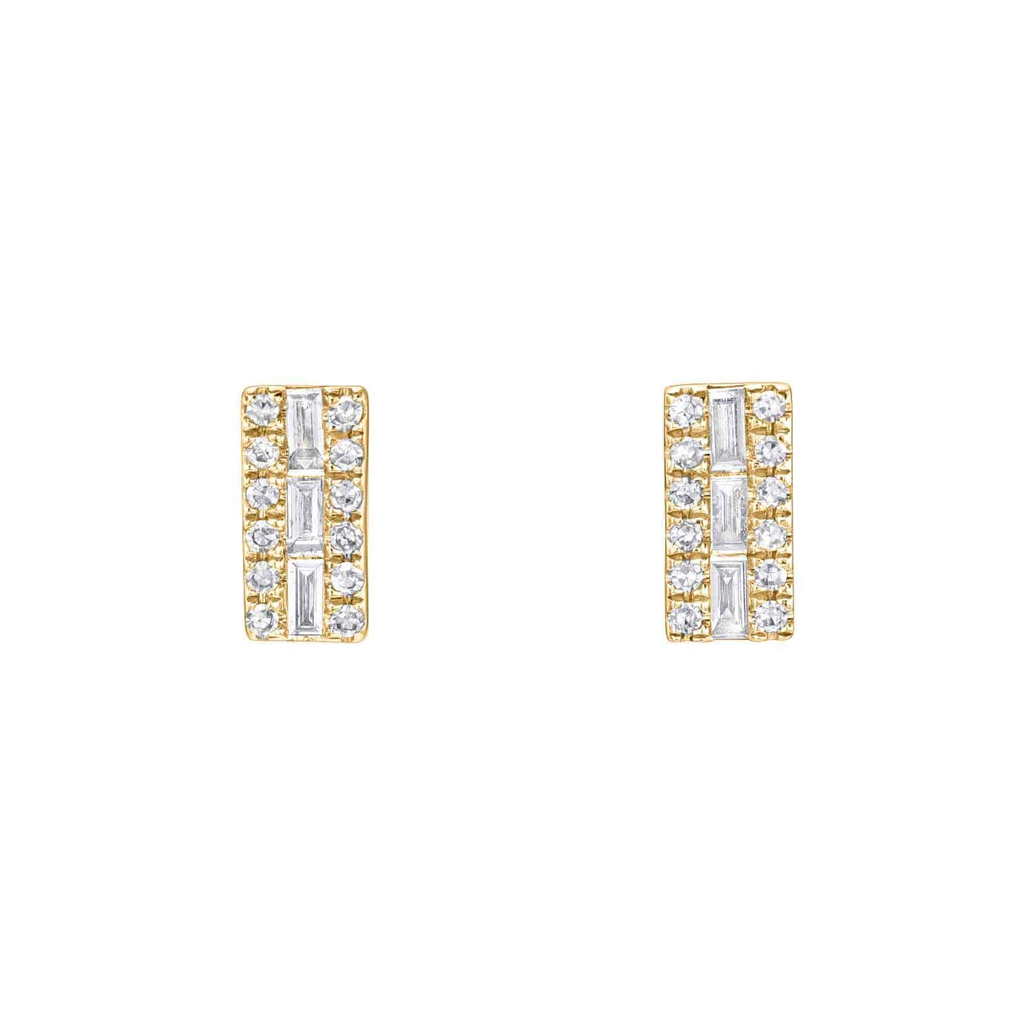The Baguette Diamond Rectangle Studs from Janet Heller Fine Jewelry are crafted in 14KT gold.  They feature rows of small round diamonds around a central emerald-cut diamond. The studs can be worn alone or layered along the ear with other earrings.