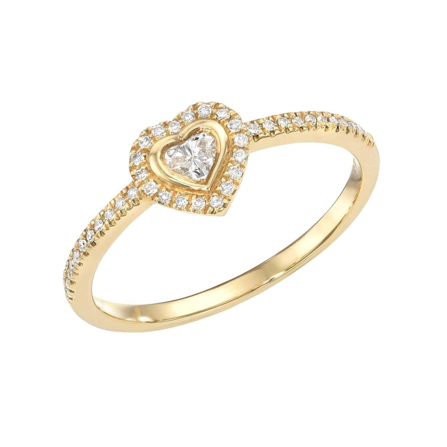 The Diamond Heart Halo Ring (SKU: RIN-399-5-Y), featuring a heart-shaped central diamond encircled by a halo of sparkling round diamonds that continue halfway down the gold band, is an exquisite piece from Janet Heller’s fine jewelry collection and is available for preorder.