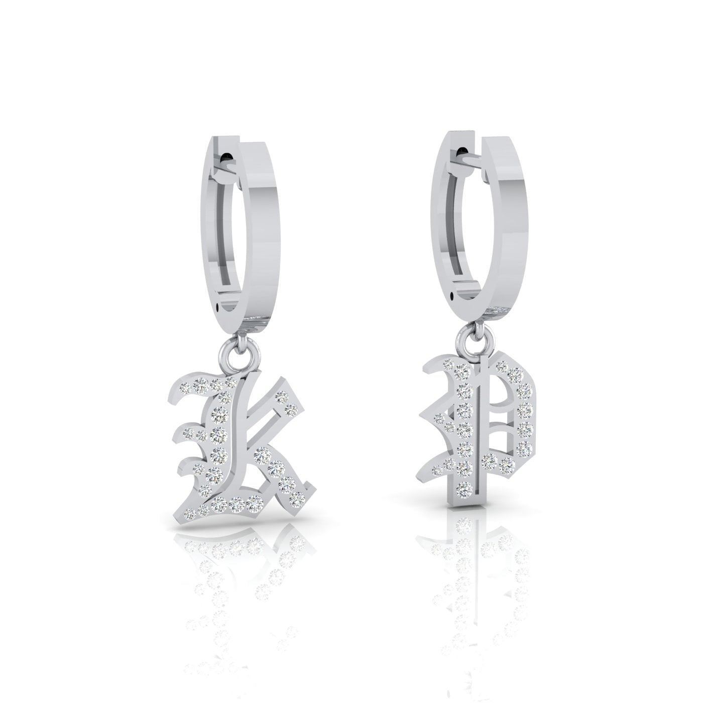 These Small Old English Initial Huggies are unique silver hoop earrings featuring ornate dangling letters K and P, adorned with tiny glistening stones, elegantly displayed upright on a white background with faint reflections.