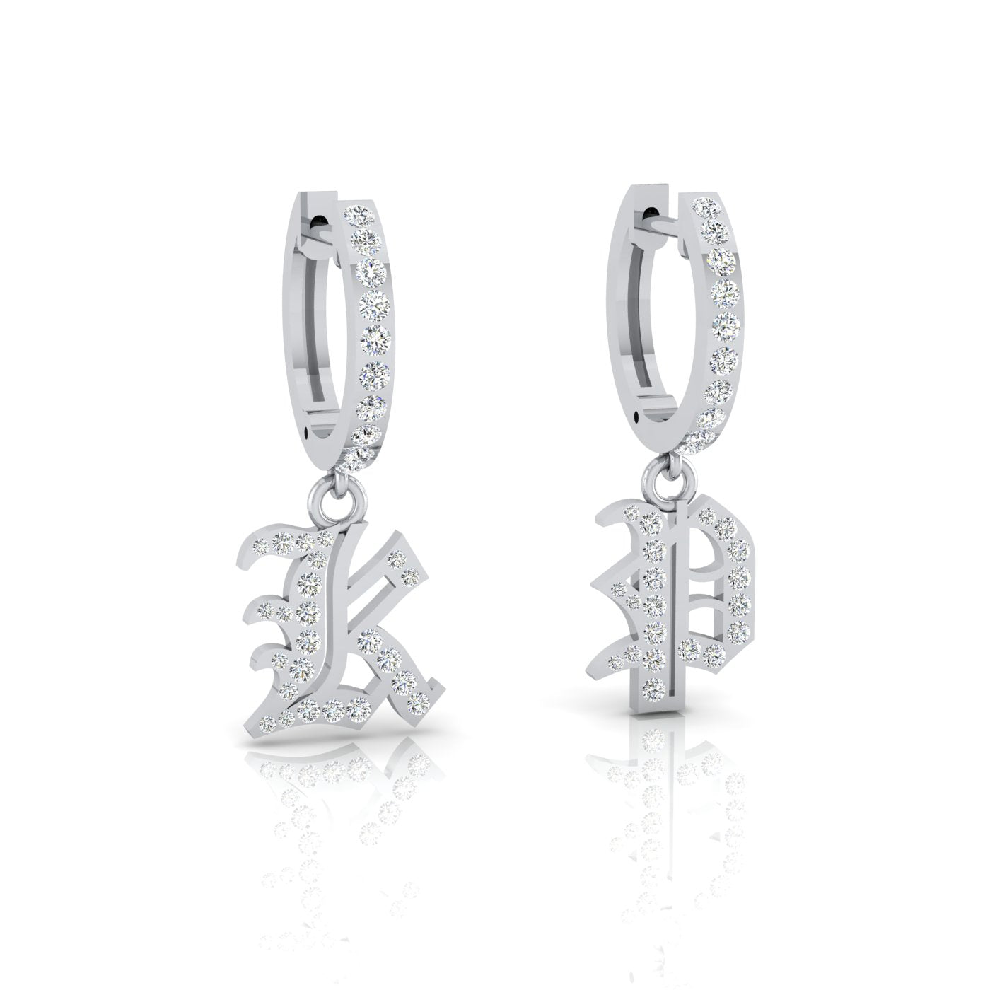 Two silver Small Old English Initial Huggies with Gothic-style letter charms, featuring K and P, adorned with sparkling stones, displayed against a white background, exuding unique elegance.