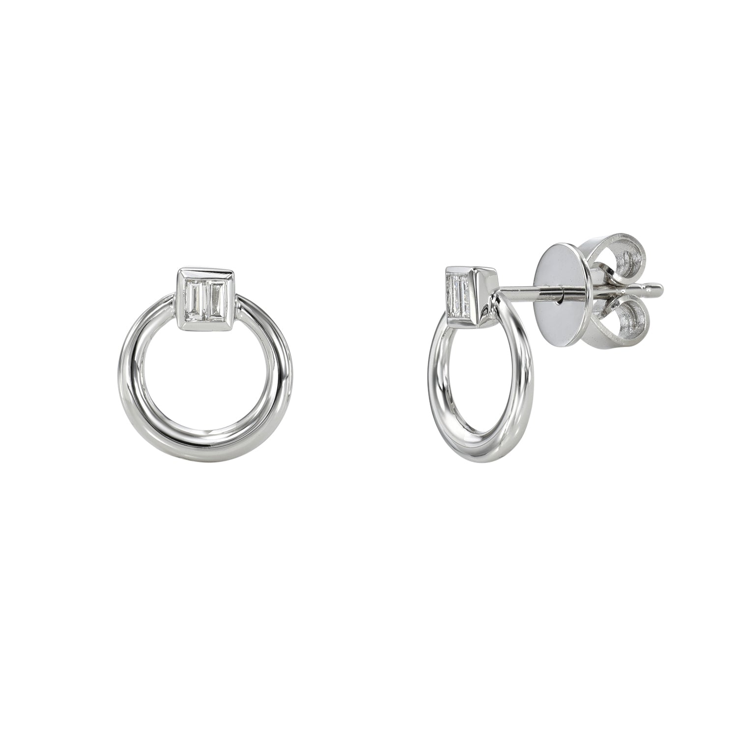 The Diamond Baguette Circle Love Knot Studs from Janet Heller Fine Jewelry are crafted in 14KT gold.  The studs feature a hoop design with a rectangular detail and a stud back closure. The studs can be worn alone or layered along the ear with other earrings.