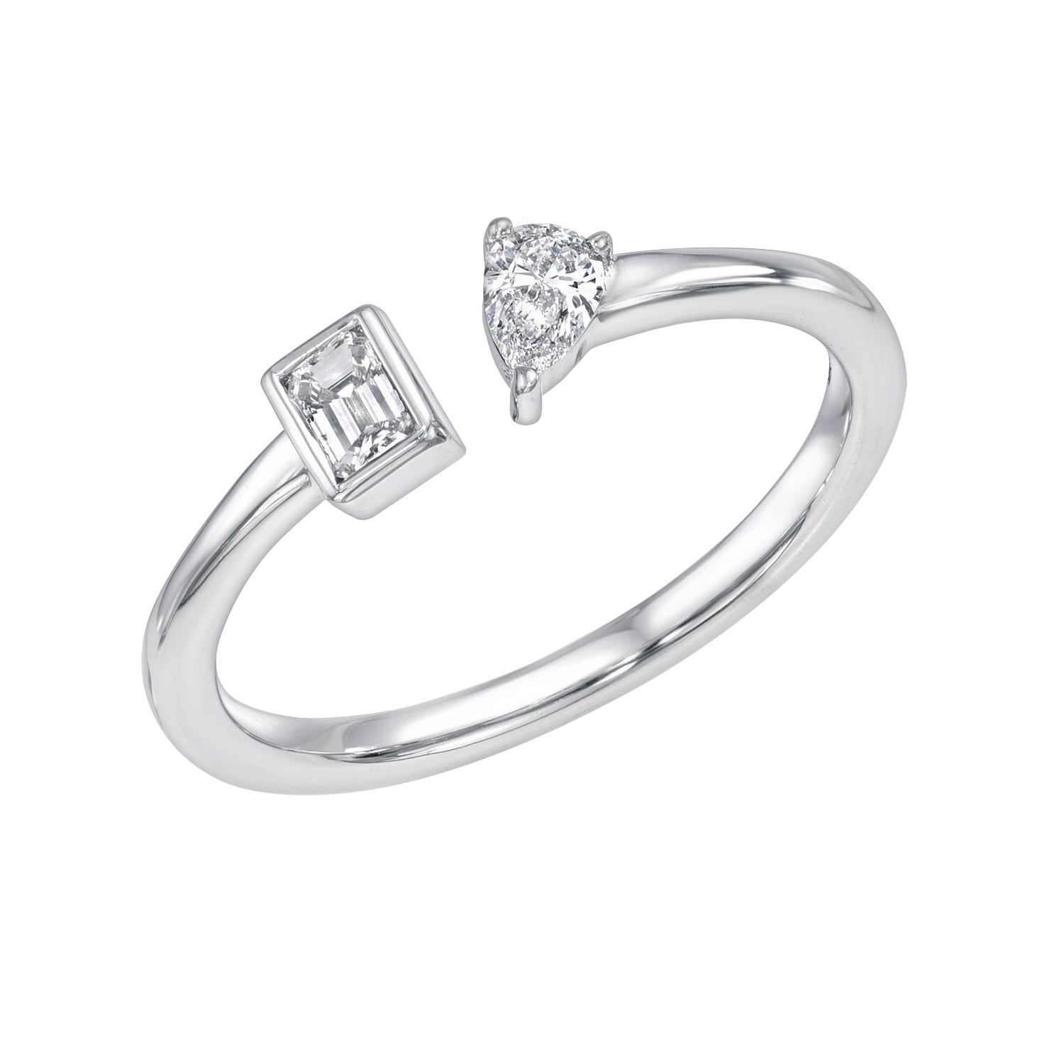 The Emerald & Pear Toi Et Moi Ring, a silver open piece available for preorder, features a rectangular emerald-cut diamond on one end and a pear-shaped diamond on the other, beautifully symbolizing love.