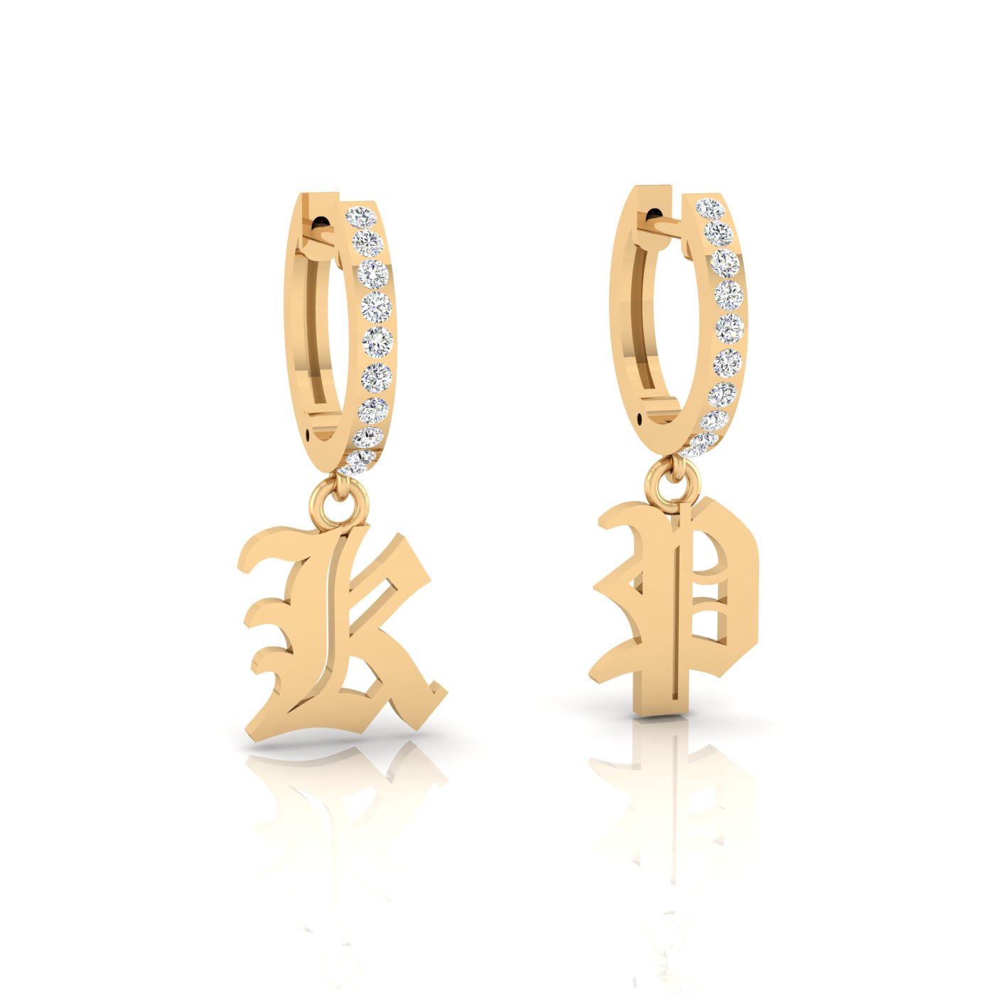 The Small Old English Initial Huggies are distinctive jewelry pieces featuring gold hoops with dangling Gothic letters A and B, each accented with diamond combinations, elegantly casting subtle shadows on a white surface.