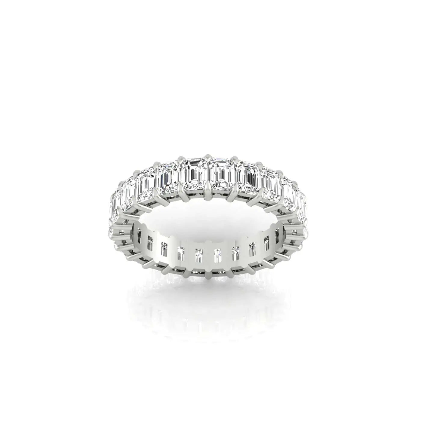 The Full Diamond Eternity Ring features silver and emerald-cut clear gemstones set in 18KT gold, elegantly displayed against a plain white background.