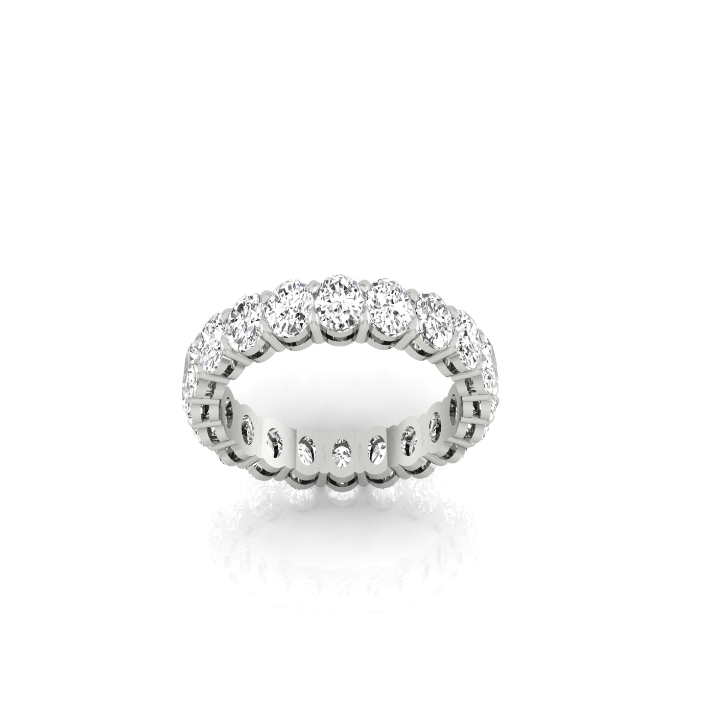 The Full Lab Grown Diamond Eternity Ring from Janet Heller Fine Jewelry, crafted in 18KT gold, features evenly spaced diamonds offered in various shapes and custom carat weights. The color of the diamonds is F and the clarity is VS. This is the perfect wedding band to be worn alone or stacked with your engagement ring.