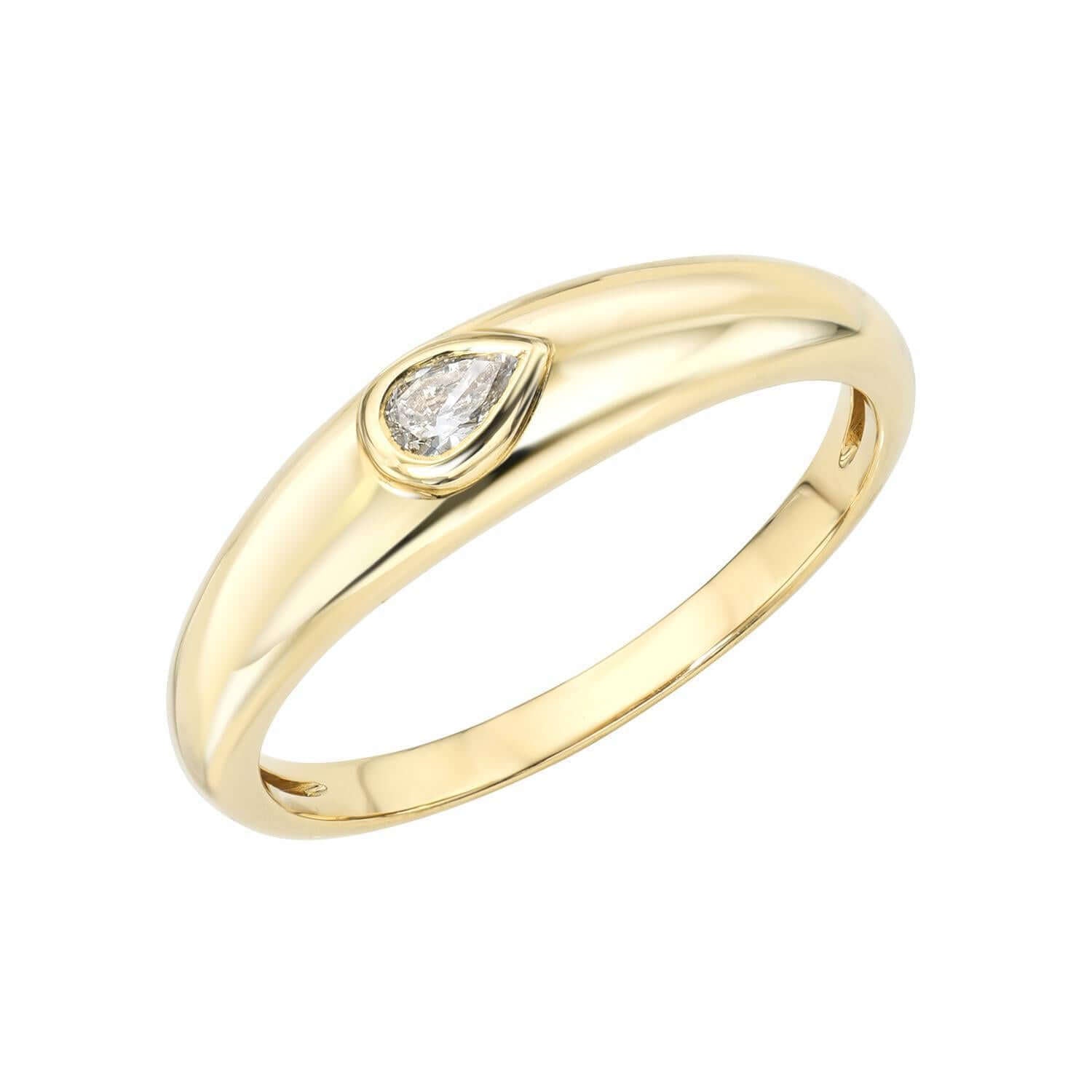 The Pear Diamond Dome Ring by Janet Heller is an exquisite piece of fine jewelry featuring a smooth gold band and a single pear-shaped diamond set in a bezel setting, available for preorder.