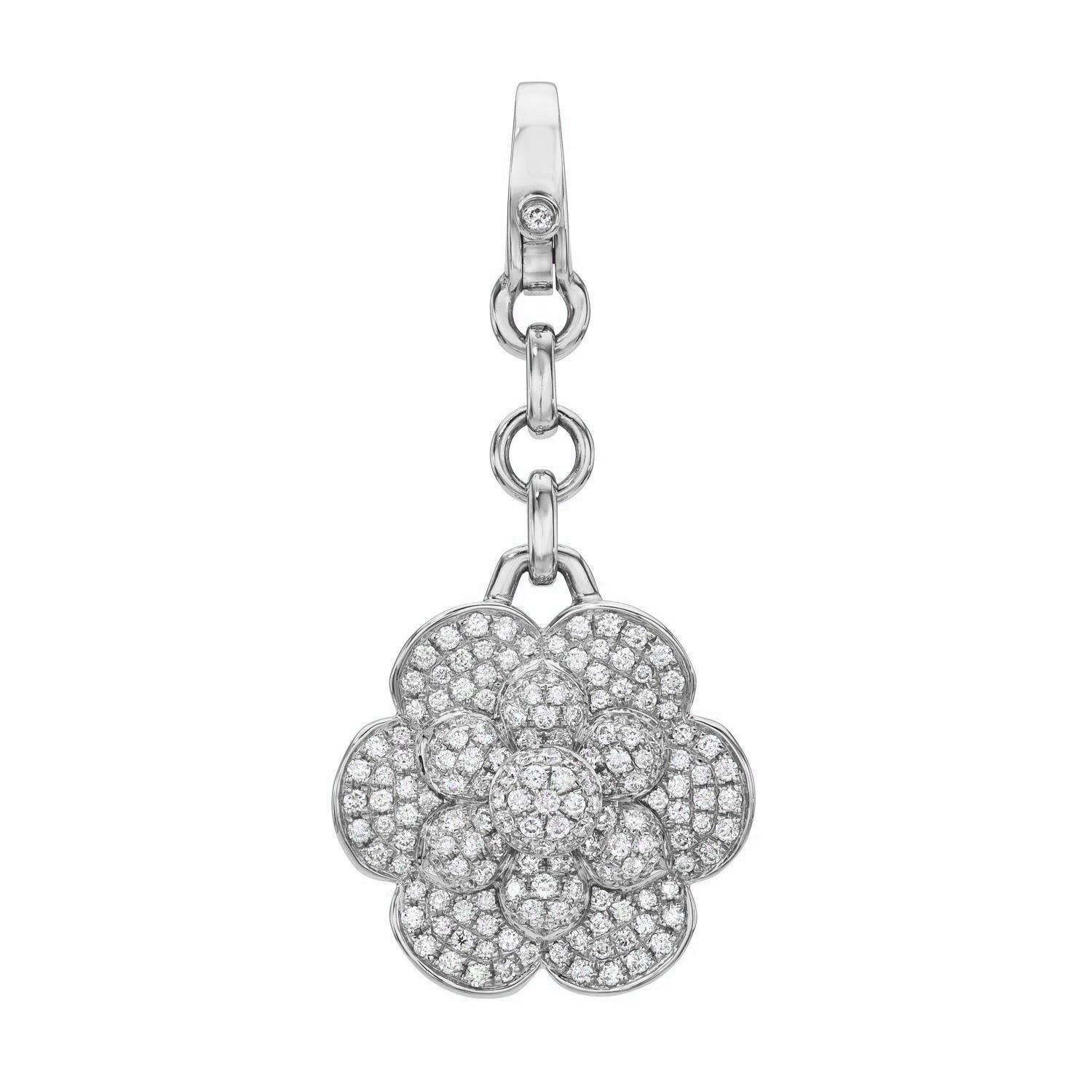The Diamond Bloom Flower Charm from Janet Heller Fine Jewelry is a silver charm shaped like a flower, adorned with sparkling diamonds. It features a short chain and loop for fastening and offers customizable options that add an ornate sophistication.