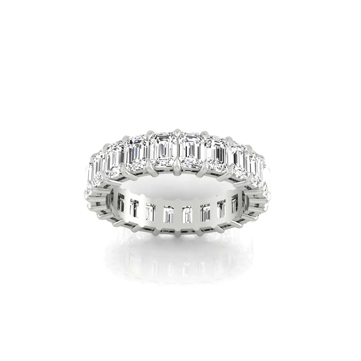 The Full Lab Grown Diamond Eternity Ring from Janet Heller Fine Jewelry, crafted in 18KT gold, features evenly spaced diamonds offered in various shapes and custom carat weights. The color of the diamonds is F and the clarity is VS. This is the perfect wedding band to be worn alone or stacked with your engagement ring.
