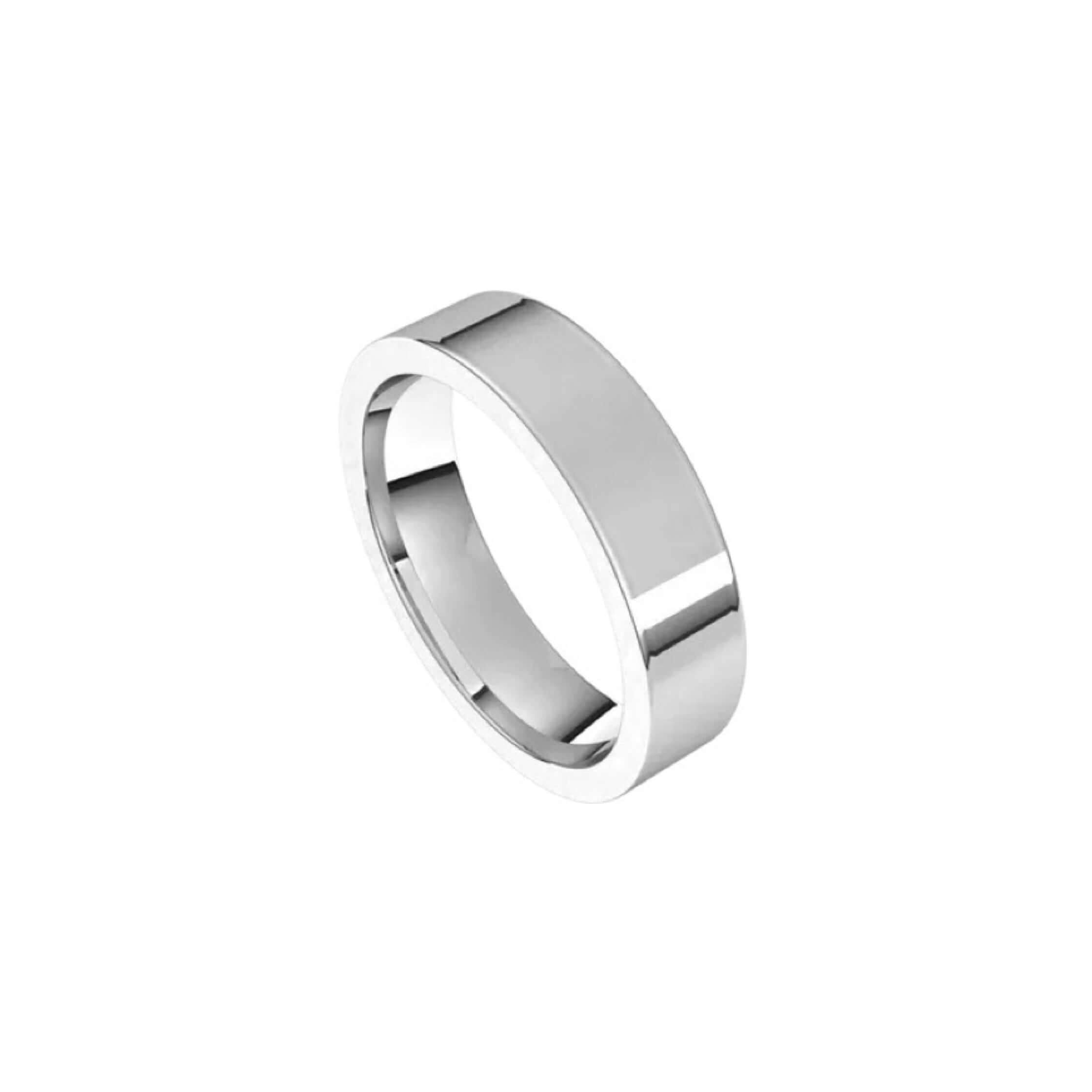 The 5mm Flat Wedding Ring from Janet Heller Fine Jewelry features a smooth and shiny polished 14KT gold surface. This ring is designed for both men and women. It can be stacked with your engagement ring or it can be worn alone as a men's wedding band.