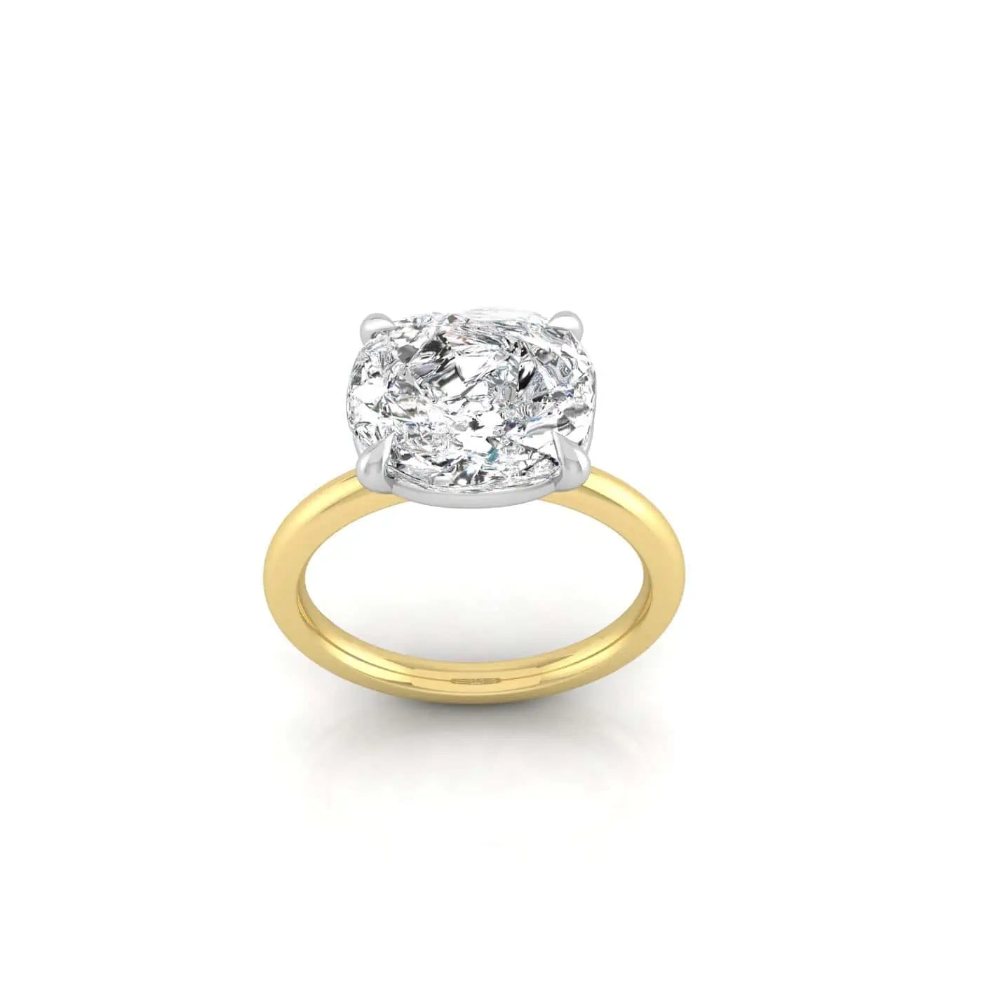 The Solitaire Ring from Janet Heller Fine Jewelry is crafted in 18KT gold. The ring features single prong-set diamond on a simple band. Any diamond shape can be paired with this setting. This is the perfect engagement ring to be worn alone or stacked with your wedding band.