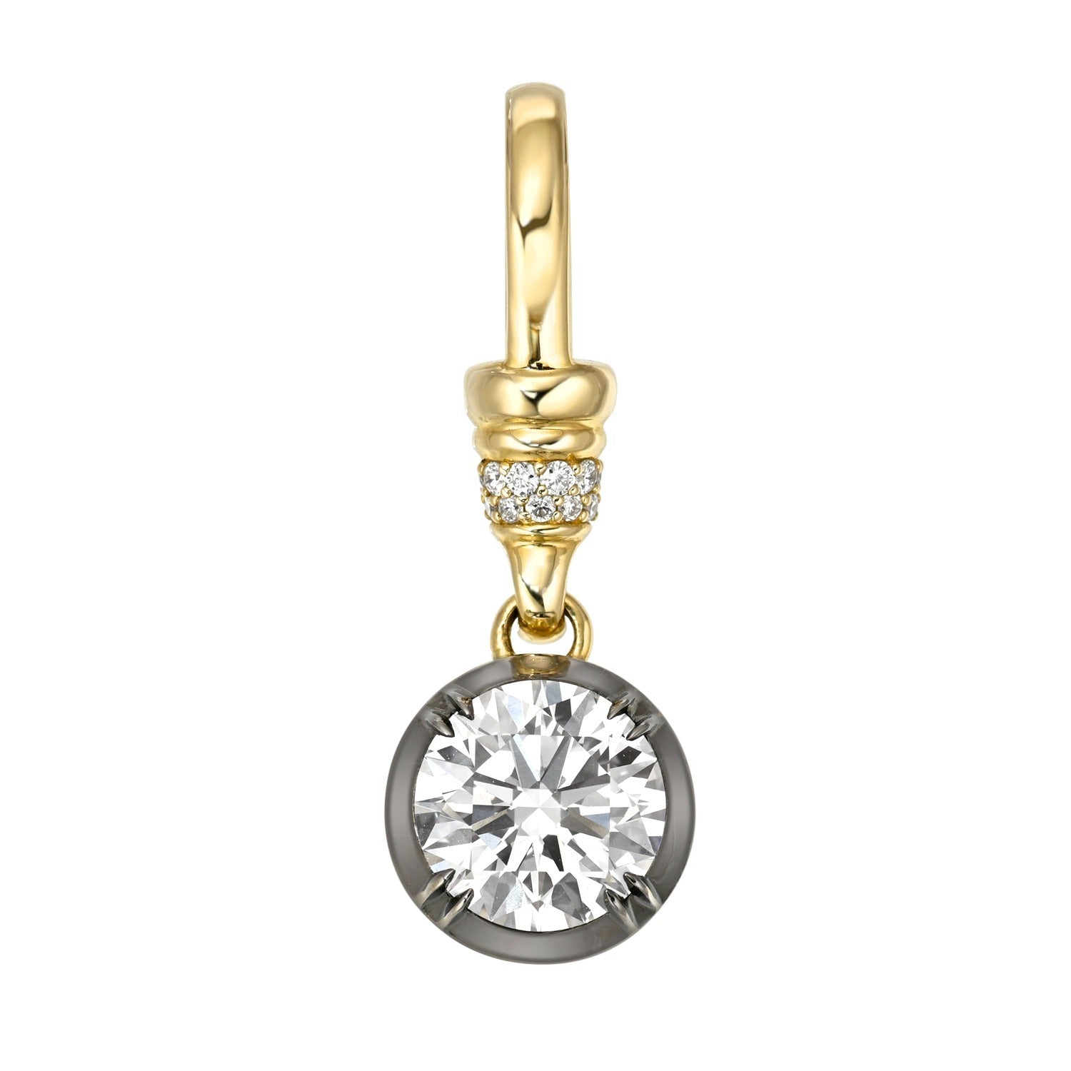 The Claw Prong Round Lab Diamond Charm features a round, clear lab diamond set in a refined gold claw prong setting, accented by small diamonds on the gold bail above the main stone—an elegant piece from Janet Heller Fine Jewelry that exudes timeless appeal.