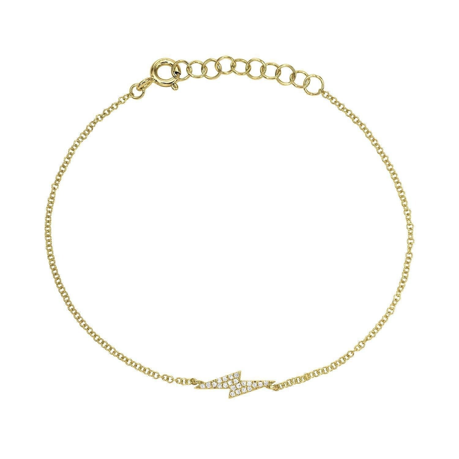 The Diamond Lightning Bolt Bracelet is a delicate gold chain adorned with a small lightning bolt charm encrusted with sparkling clear stones, and features an adjustable clasp with multiple loop options for the perfect fit.