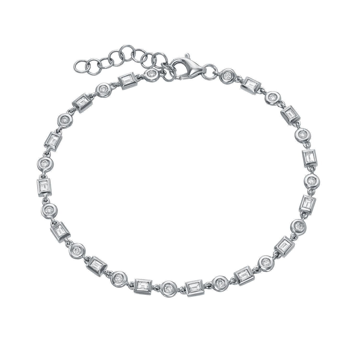 Introducing the Diamond Nicolette Bracelet by Janet Heller Fine Jewelry—a delicate silver bracelet featuring alternating round and square clear gemstones, an adjustable chain, and a secure lobster clasp closure. Perfect for lovers of exquisite fine jewelry.