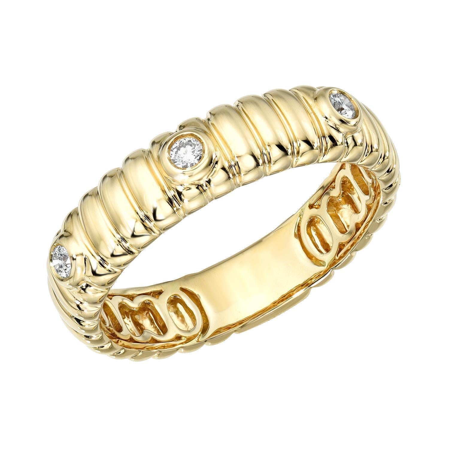 The Diamond Rowan Bezel Ridge Band features a gold ribbed band with round bezel-set diamonds, a polished interior with decorative pattern, and comes in multiple sizes. Preorder exclusively from Janet Heller Fine Jewelry.