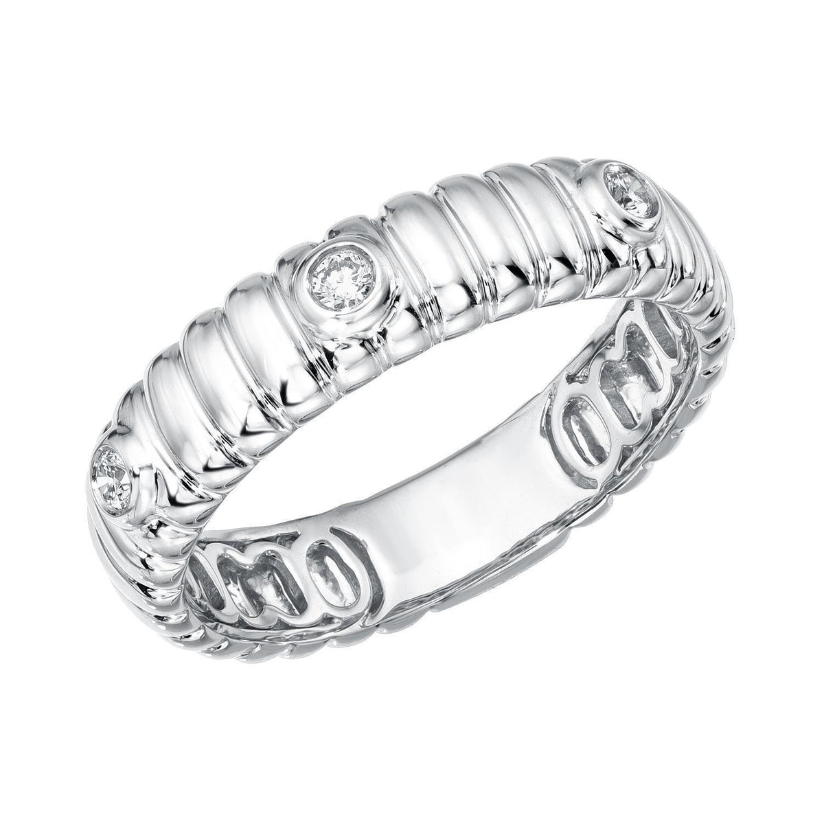 A silver ribbed band with round diamonds—discover the Diamond Rowan Bezel Ridge Band by Janet Heller fine jewelry and select your ring size to preorder this stunning piece.