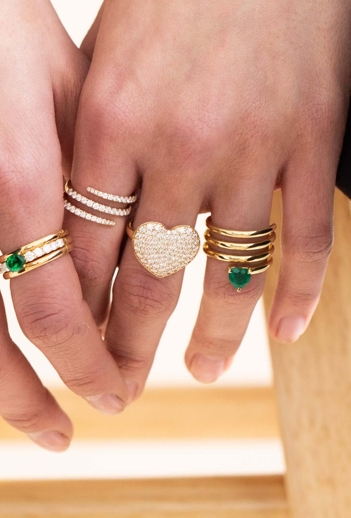 The Jumbo Diamond Heart Ring from Janet Heller Fine Jewelry is crafted in 14KT gold. The band features a large, gold encrusted heart. The ring can be worn alone or along side other rings.