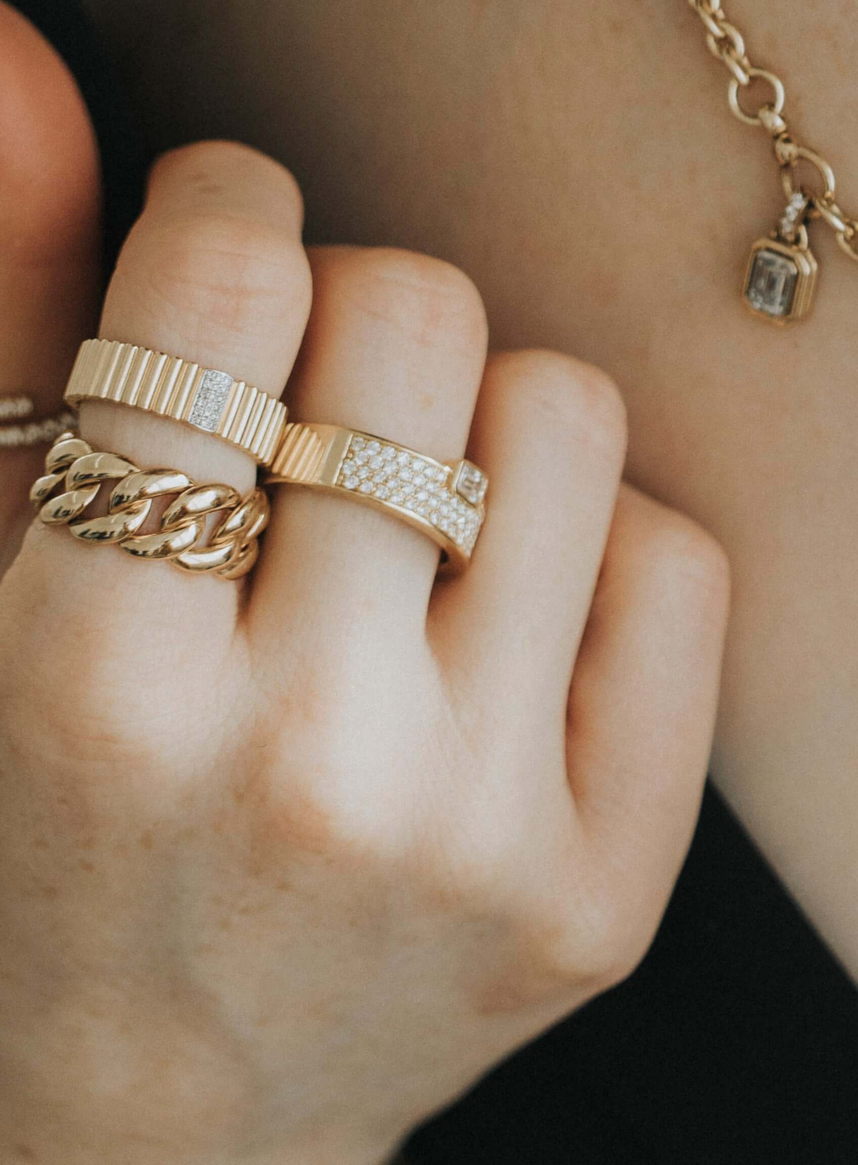 The Plain Cuban Link Ring from Janet Heller Fine Jewelry is is crafted in 14KT gold.  It features an interlocking chain design with rounded links.