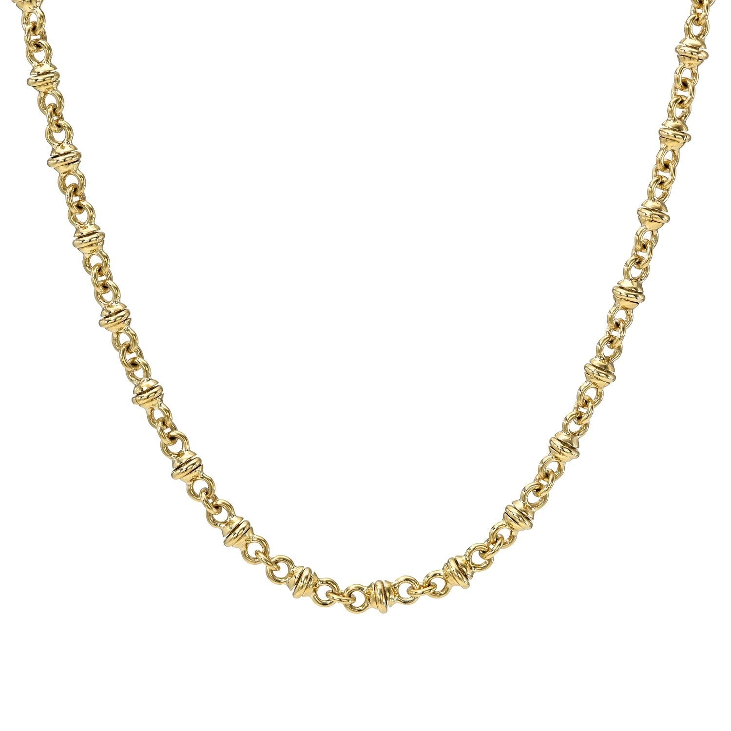 The Handmade Figure 8 Chain Necklace, crafted in 14KT gold, features a repeating pattern of small, textured links and is elegantly displayed against a white background. This handmade necklace gracefully curves from the upper corners to the center, highlighting its exquisite craftsmanship.