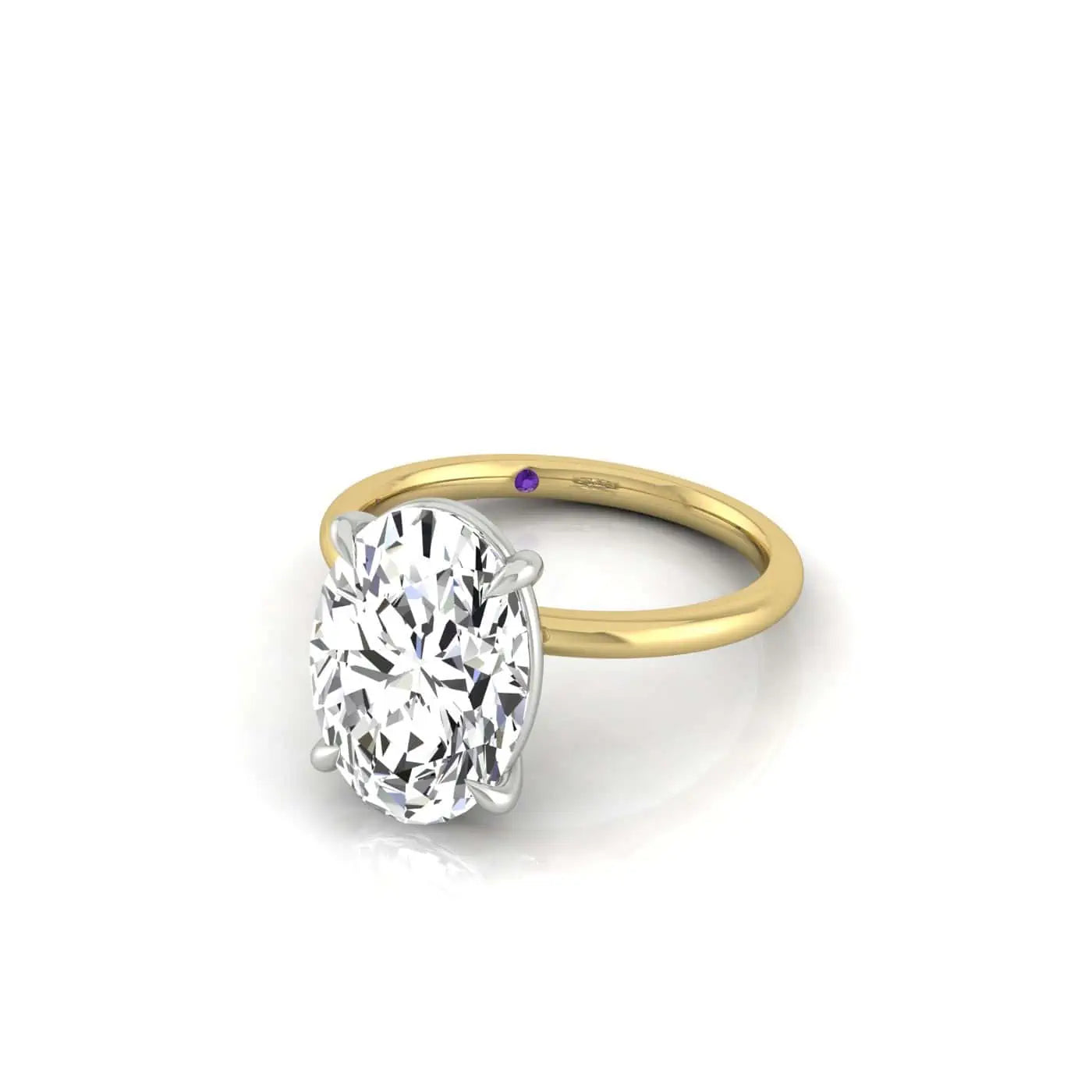 The Solitaire engagement ring is crafted in 18KT gold with an oval-cut diamond secured by four prongs in a classic setting. A discreet purple detail adorns the inside of its minimalist band, creating an elegant shine against a white background.