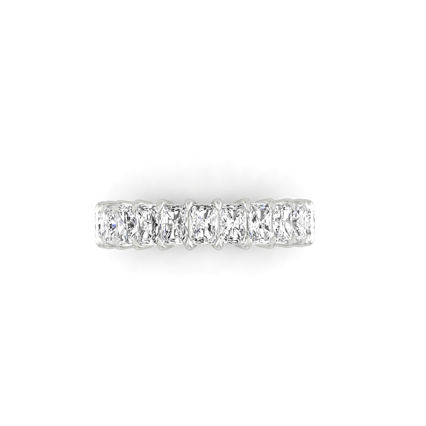 The Half Diamond Eternity Ring is a silver band featuring VS clarity diamonds set in a row of rectangular clear stones, viewed from above on a white background.