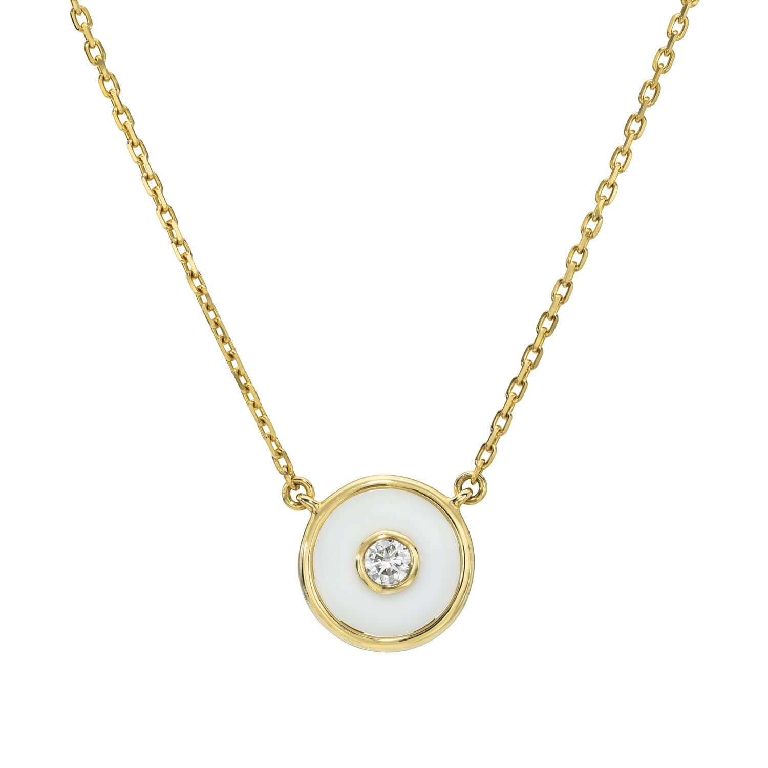 This Janet Heller fine jewelry piece, named the Round Diamond Cocholong Necklace, is a gold chain with a round pendant featuring a white background and central clear gemstone. The gold-bordered pendant can be customized for a simple yet elegant design.