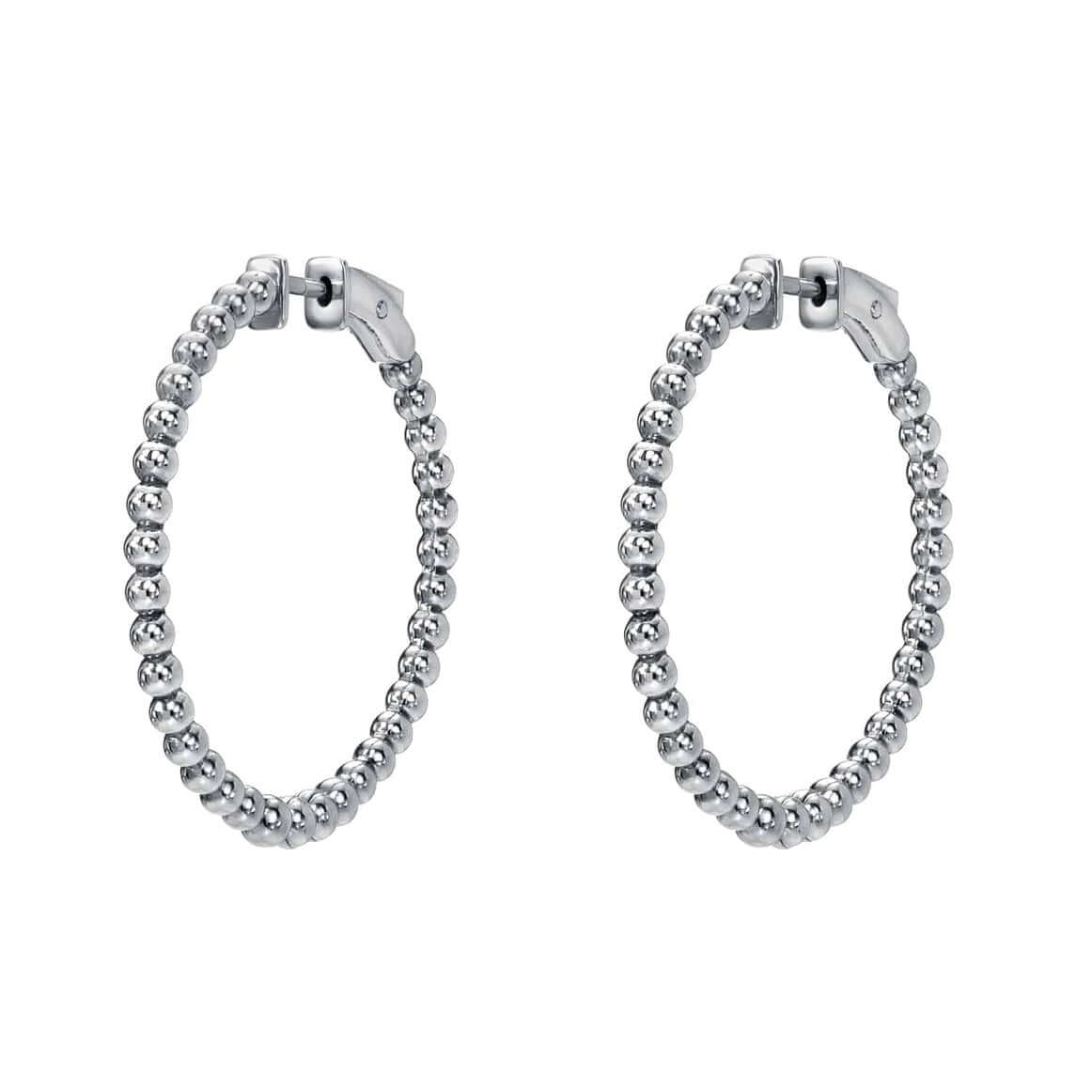 The Nora Hoops are silver earrings with a beaded texture in a circular design, shown on a white background.