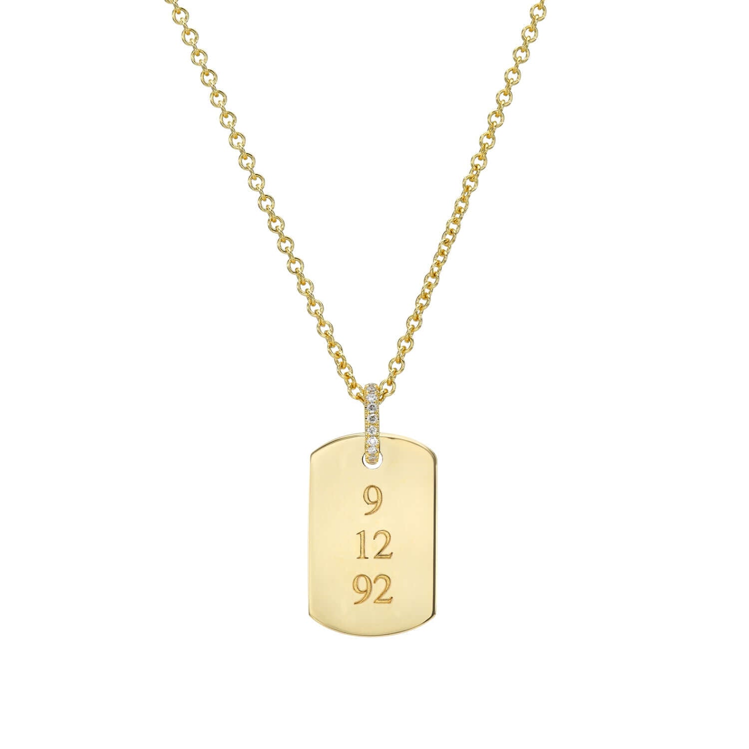 The Medium Dog Tag Engravable Pendant Necklace from the Janet Heller Fine Jewelry Sketch Collection, features a 14KT gold rectangular pendant with rounded corners and a diamond bale. The pendant is perfect for engraving a personalized keepsake.