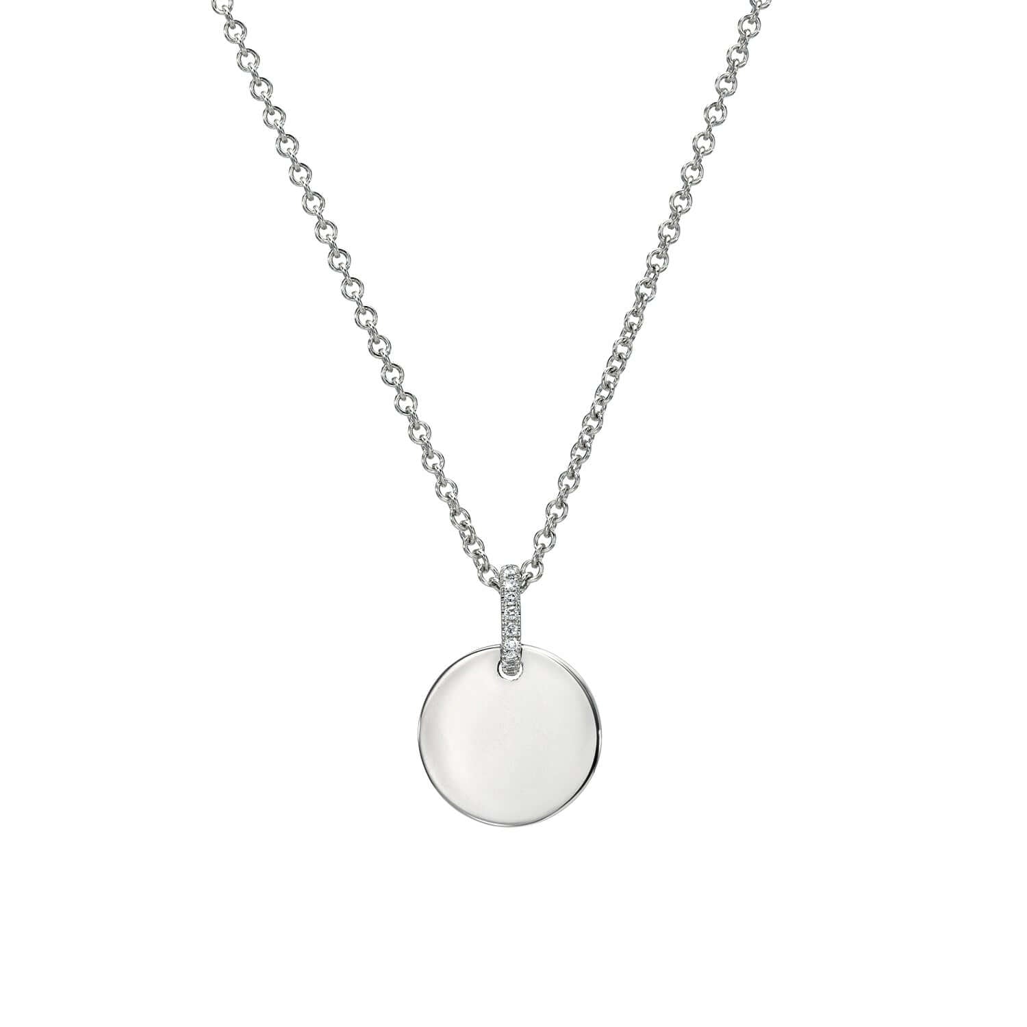 The Mini Round Engravable Pendant Necklace from the Janet Heller Fine Jewelry Sketch Collection, features a 14KT gold round pendant and a diamond bale. The pendant is perfect for engraving a personalized keepsake.