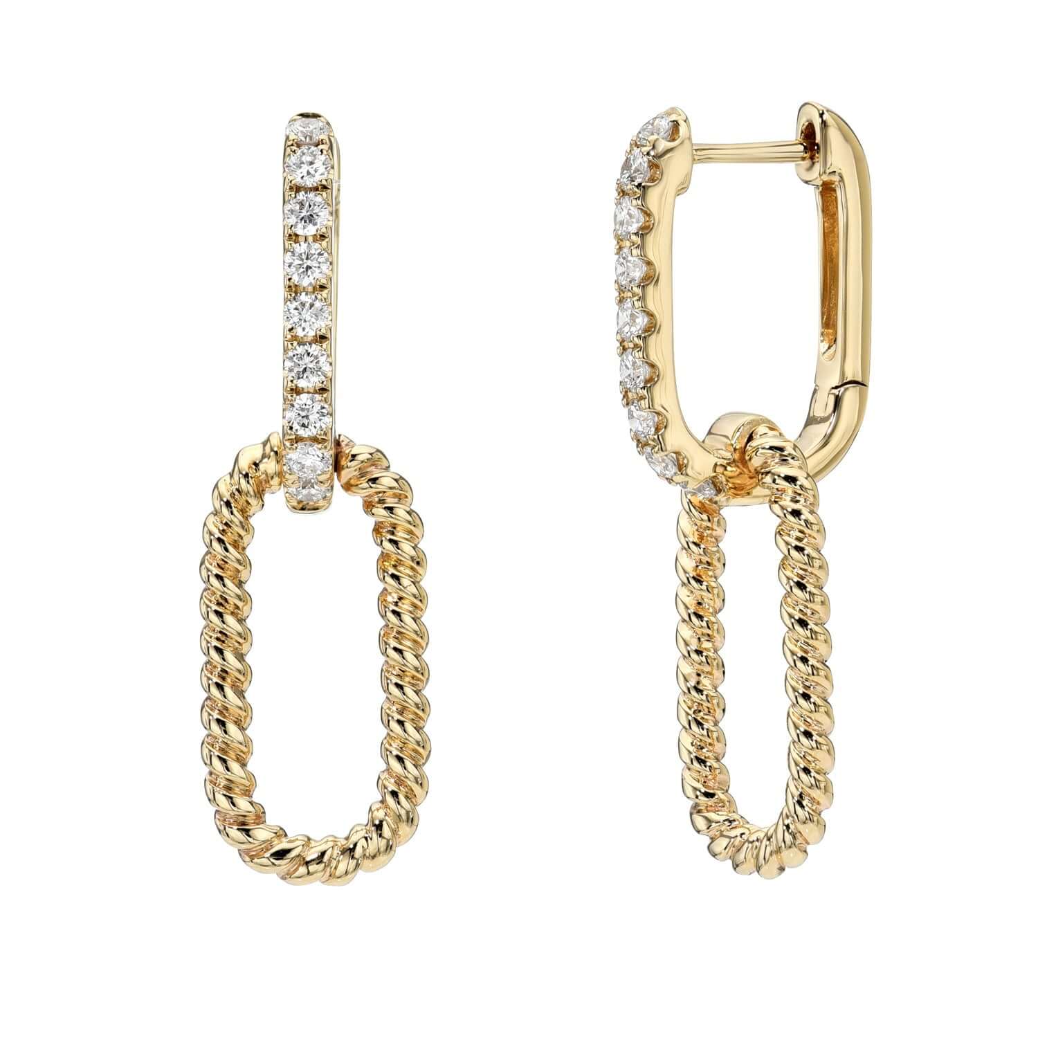 The Diamond Kit Earrings from Janet Heller Fine Jewelry are crafted in 14KT gold.  The top link of the dangling earrings feature diamonds while the second link has a twisted rope design in plain gold.  The earrings can be worn alone or layered along the ear with other earrings.