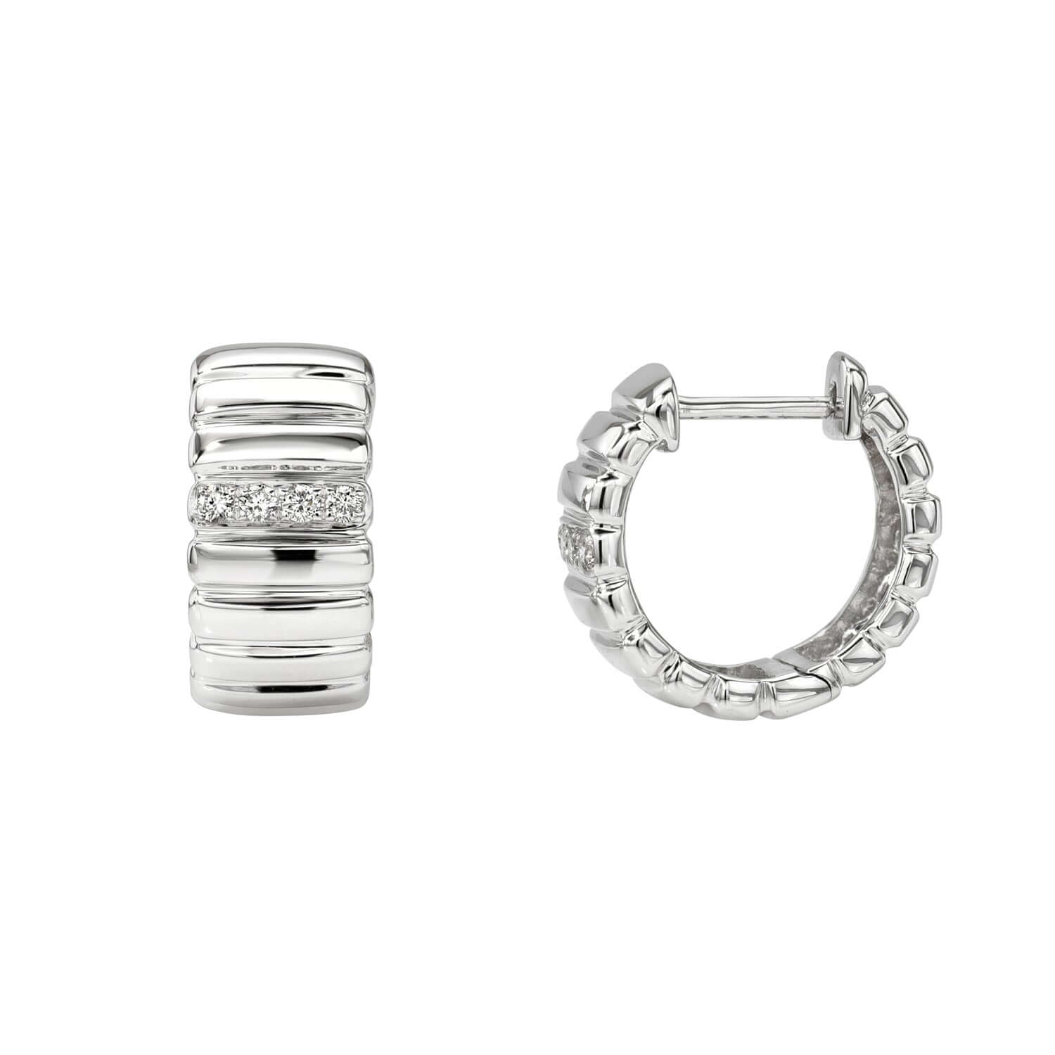 The Diamond Ridge Rio Huggies are silver hoop earrings with a ridged design and a central band of sparkling stones, displaying fine jewelry craftsmanship. One earring shows the front view, while the other reveals the circular shape and clasp. Contact us for customizations.