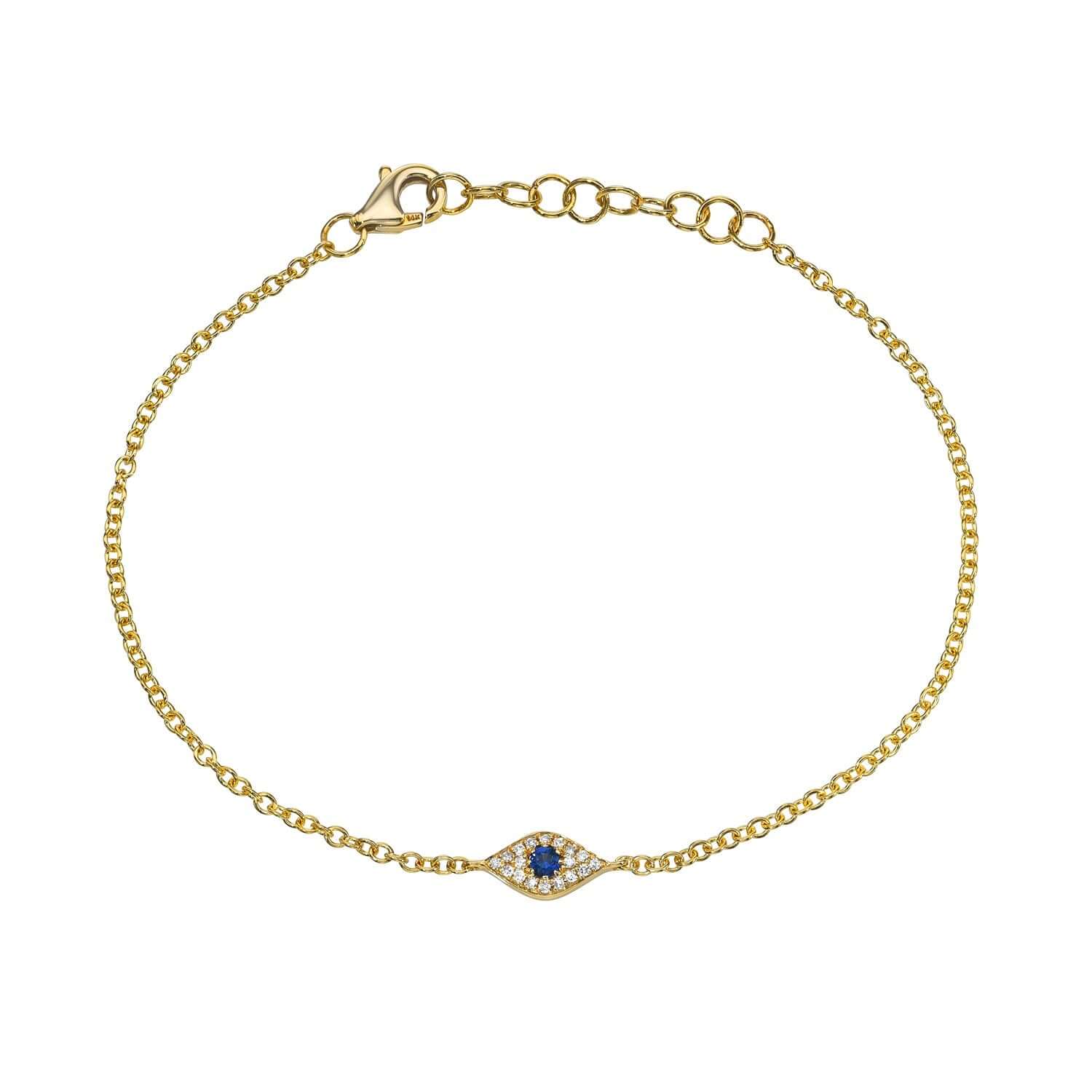 The Diamond & Blue Sapphire Evil Eye Bracelet from Janet Heller Fine Jewelry is crafted in 14KT gold.  The delicate bracelet showcases a blue sapphire and diamond evil eye,
with a lobster clasp and adjustable links.  The chain bracelet can be layered or worn on its own.
