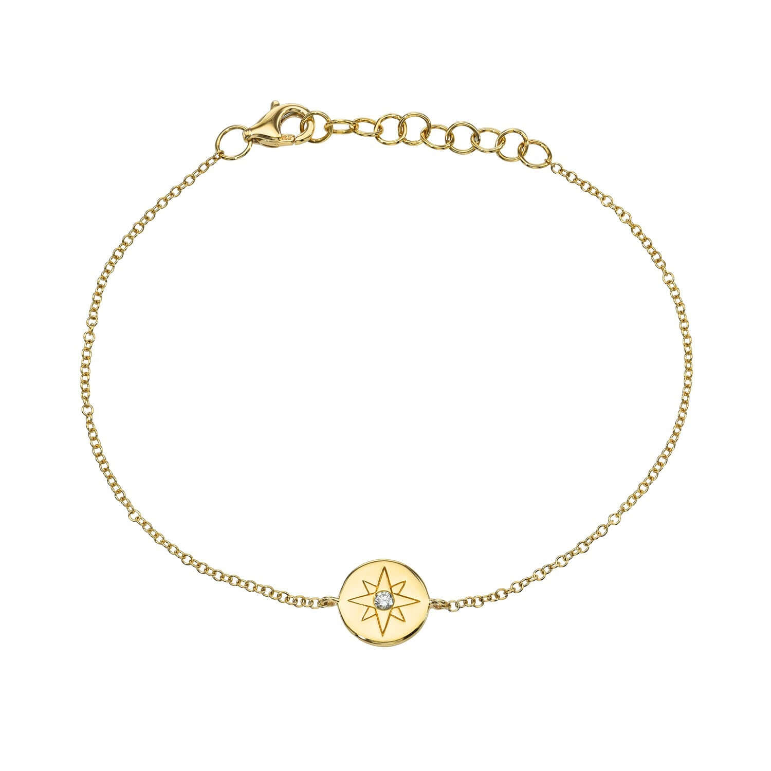 The Celestial Star Diamond Disc Bracelet from Janet Heller Fine Jewelry is crafted in 14KT gold. This delicate chain features a lobster clasp and a circular charm with a diamond star design.  The adjustable bracelet can be layered ow worn on its own.