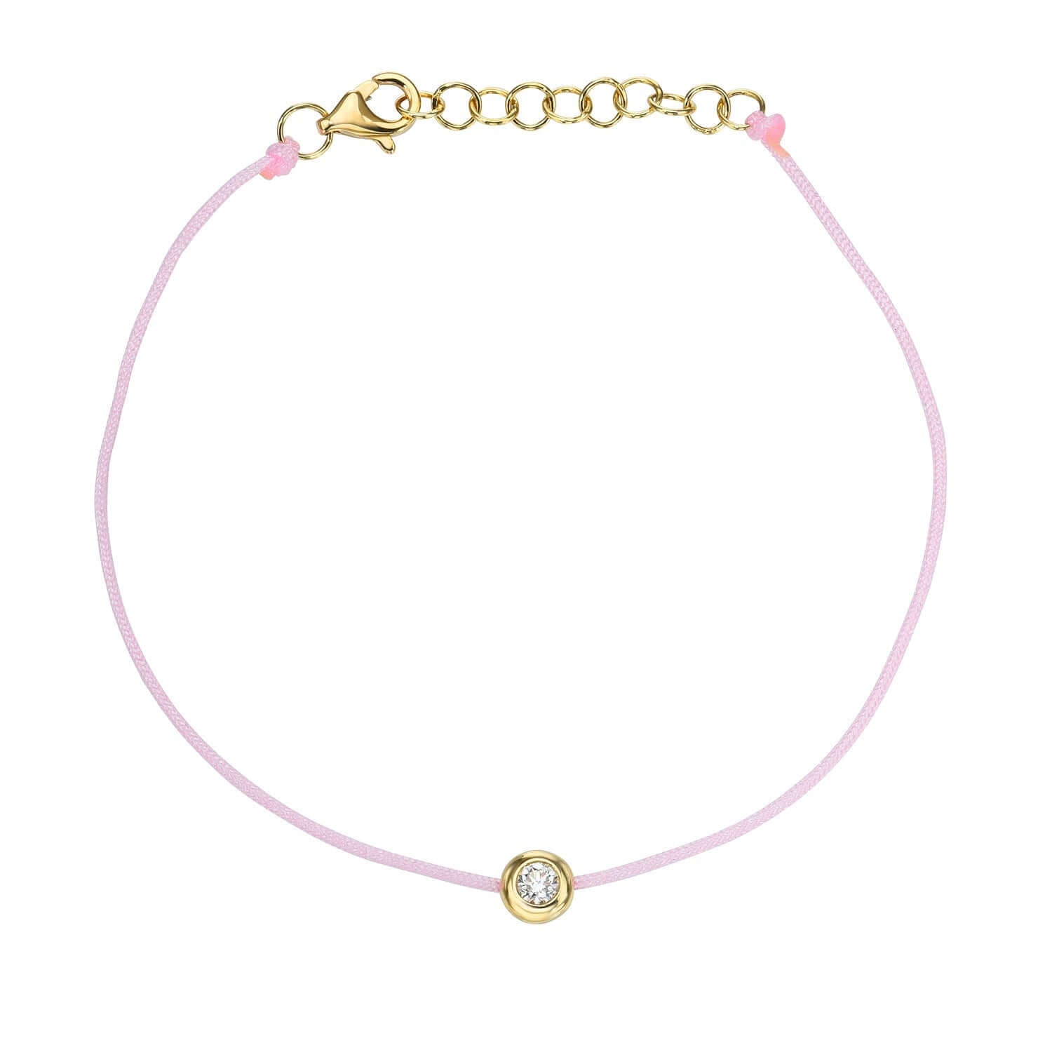 The Pink Round Diamond Cord Bracelet features a delicate light pink cord and gold clasp, highlighted by a central gold charm with a diamond-like gem. For customization inquiries, please contact us.