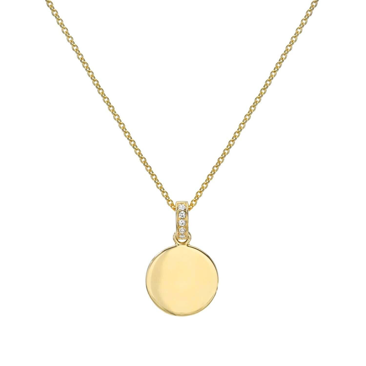 Introducing the 14KY Mini Round Diamond Engravable Disc Necklace: a gold necklace featuring a round, polished disc pendant. The pendant is elegantly attached to the fine chain by a small loop adorned with three clear, sparkling diamonds. This delicate piece showcases the timeless elegance of Janet Heller Fine Jewelry—ideal for those interested in custom jewelry or jewelry inquiries.
